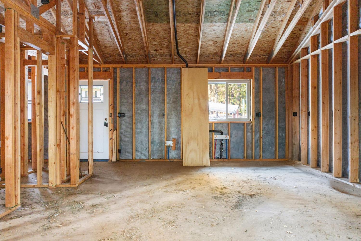 16277 Ophir Silver Road Nevada City, CA 95959 - Photo 12 of 51 a view of empty room with wooden walls
