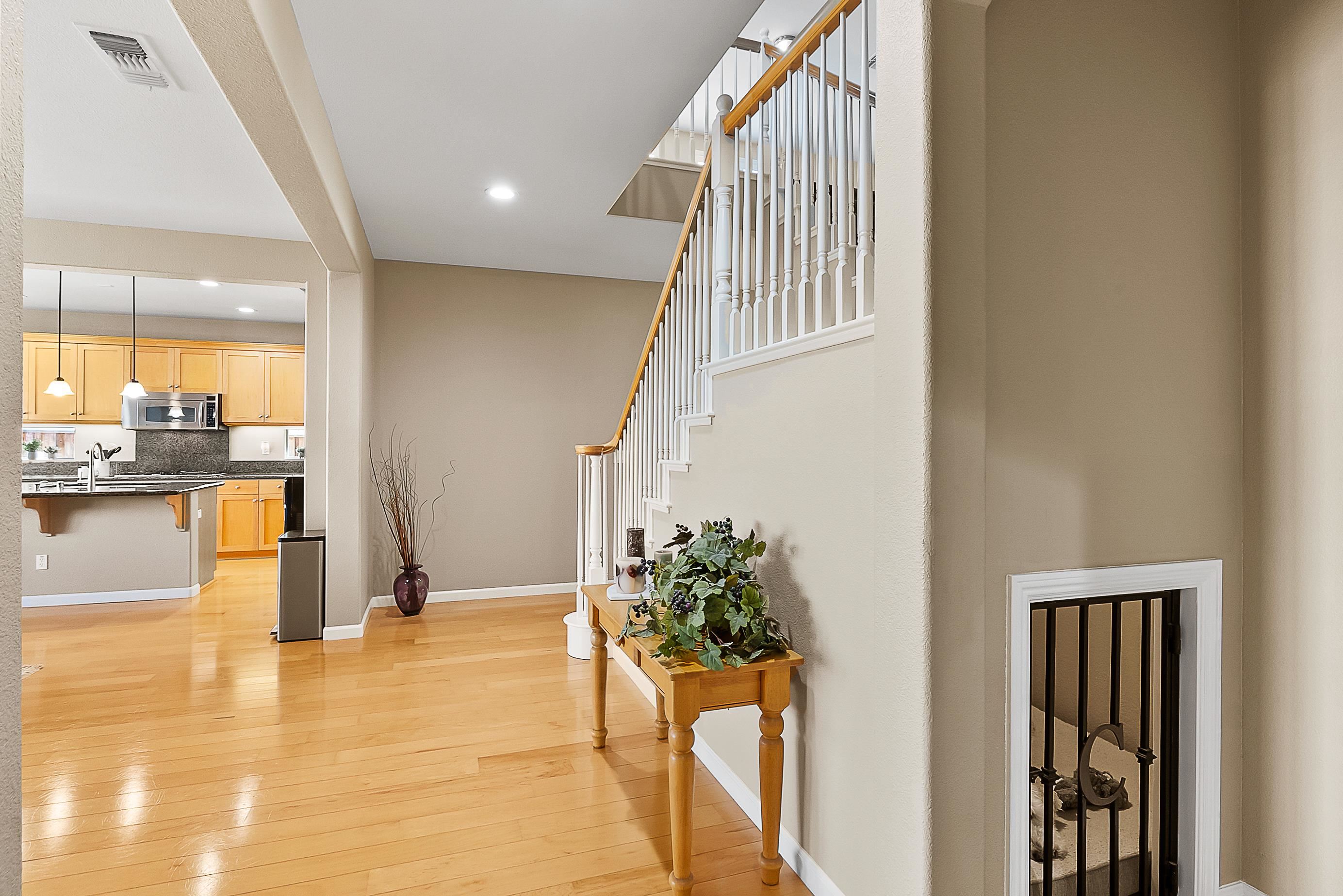 5282 Fern Ridge Circle Discovery Bay, CA 94505 - Photo 21 of 41 a view of a hallway view with wooden floor and a living room
