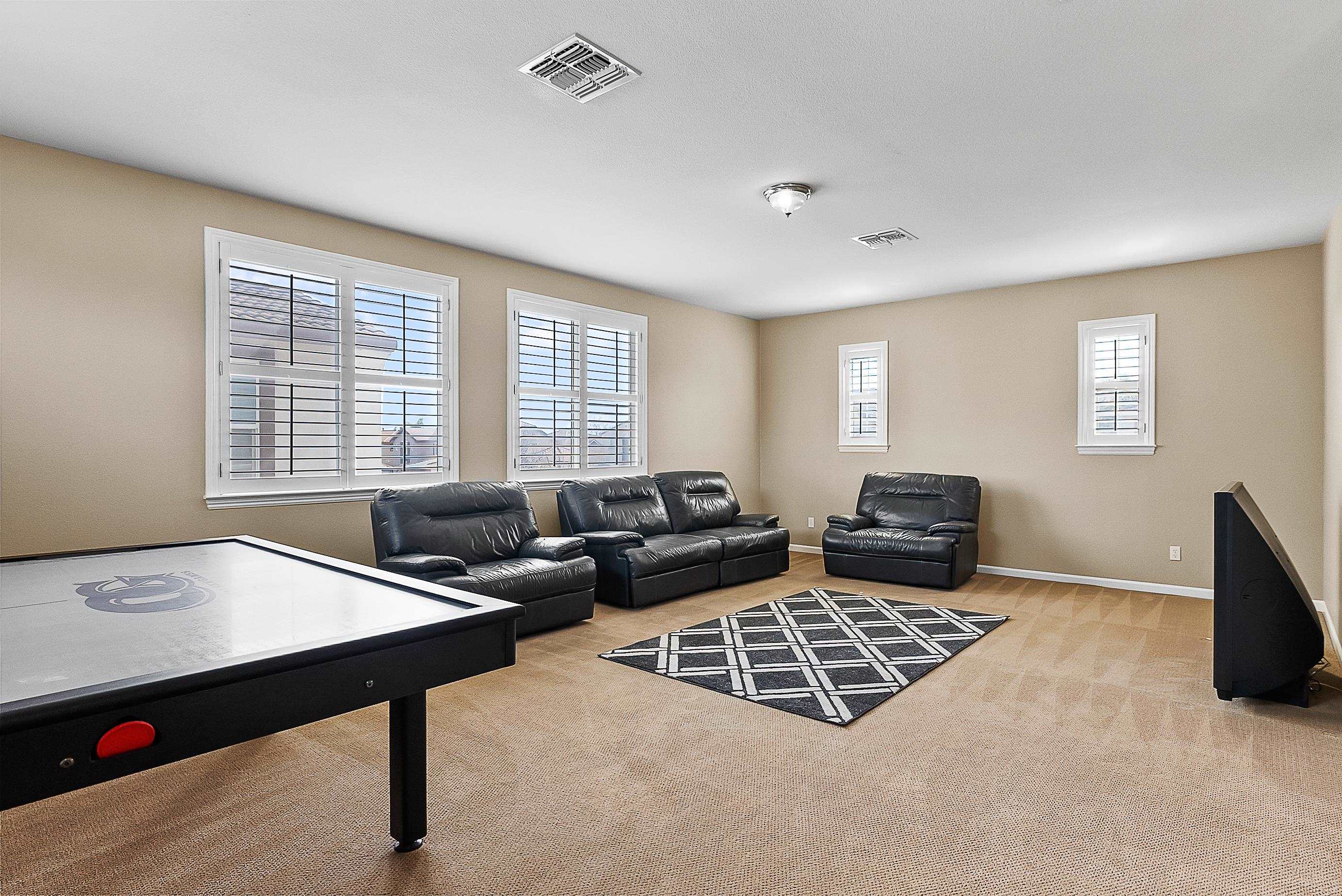 5282 Fern Ridge Circle Discovery Bay, CA 94505 - Photo 25 of 41 a living room with furniture and a flat screen tv