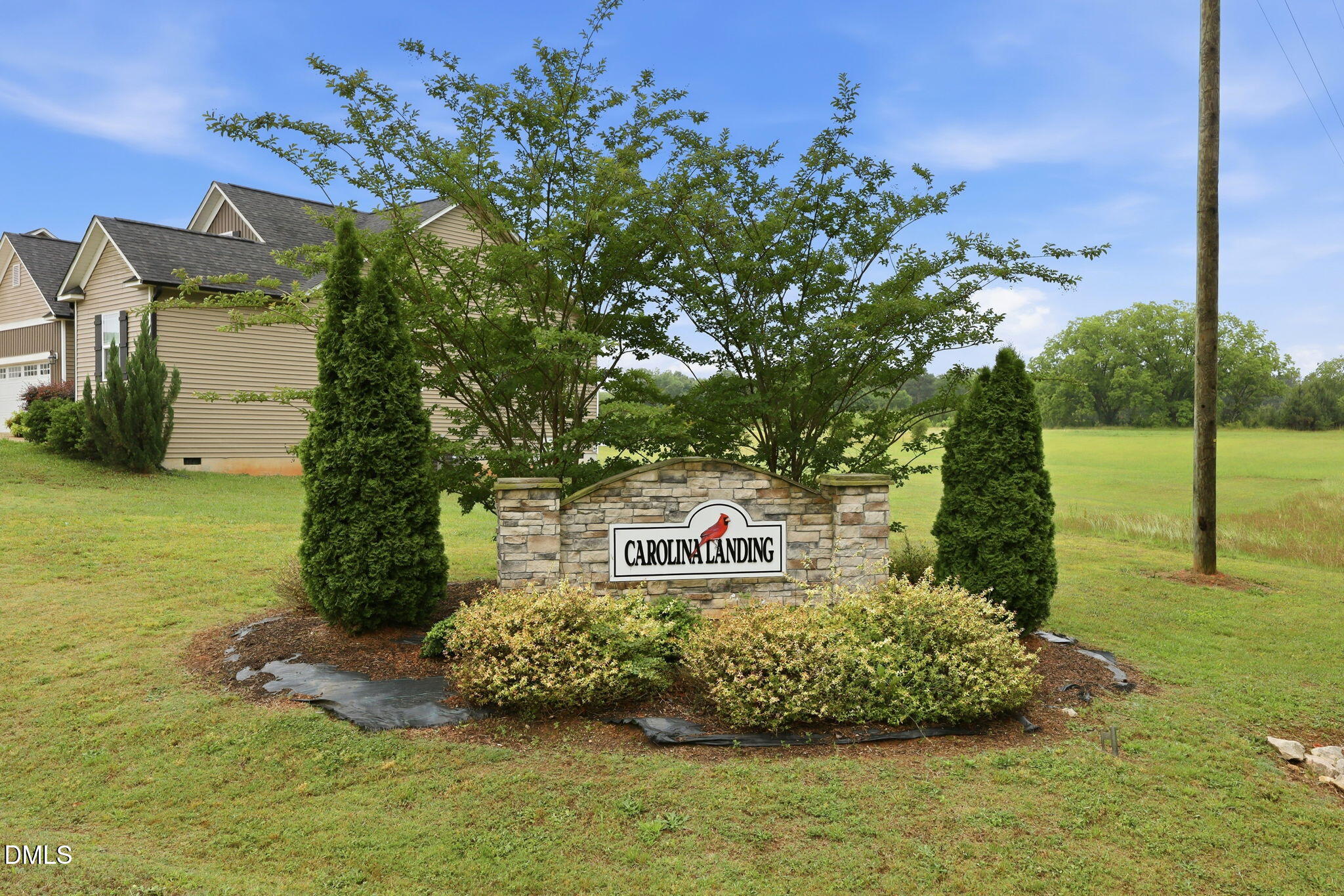 146 Seahawk Way Zebulon, NC 27597 - Photo 8 of 51 a green field with lots of tress in it