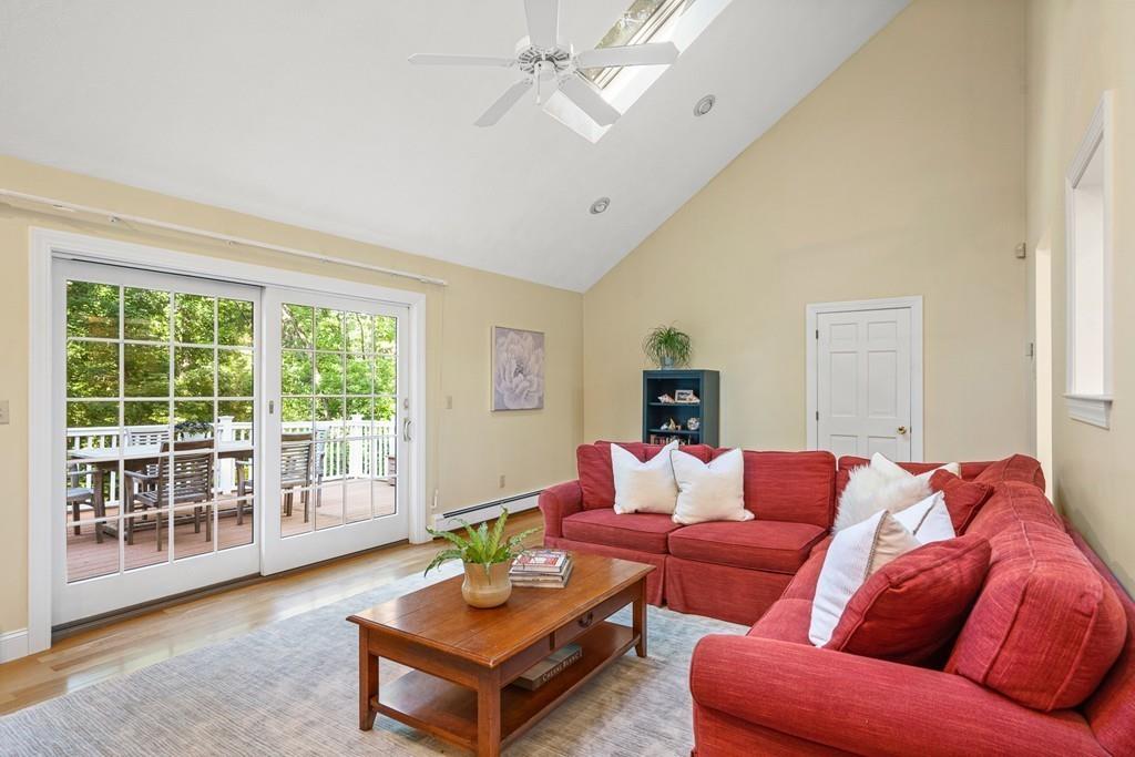 9 Deepwoods Drive Natick, MA 01760 - Photo 11 of 31 a living room with furniture and a large window
