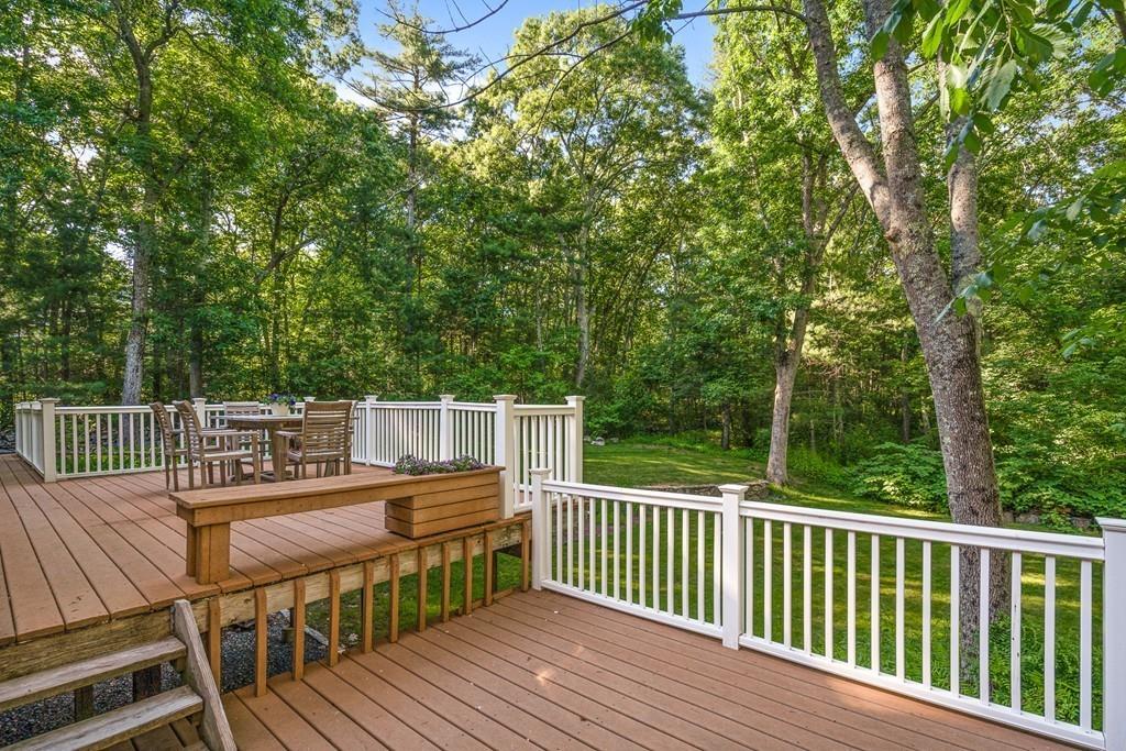 9 Deepwoods Drive Natick, MA 01760 - Photo 29 of 31 a view of balcony with furniture and trees
