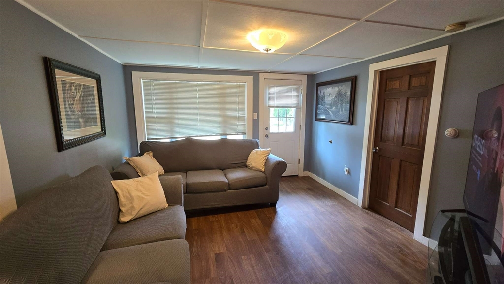 32 Birch Road Natick, MA 01760 - Photo 18 of 38 a living room with furniture and a window