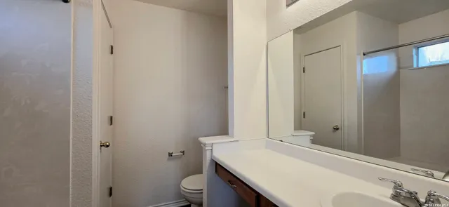 a bathroom with a sink and a toilet