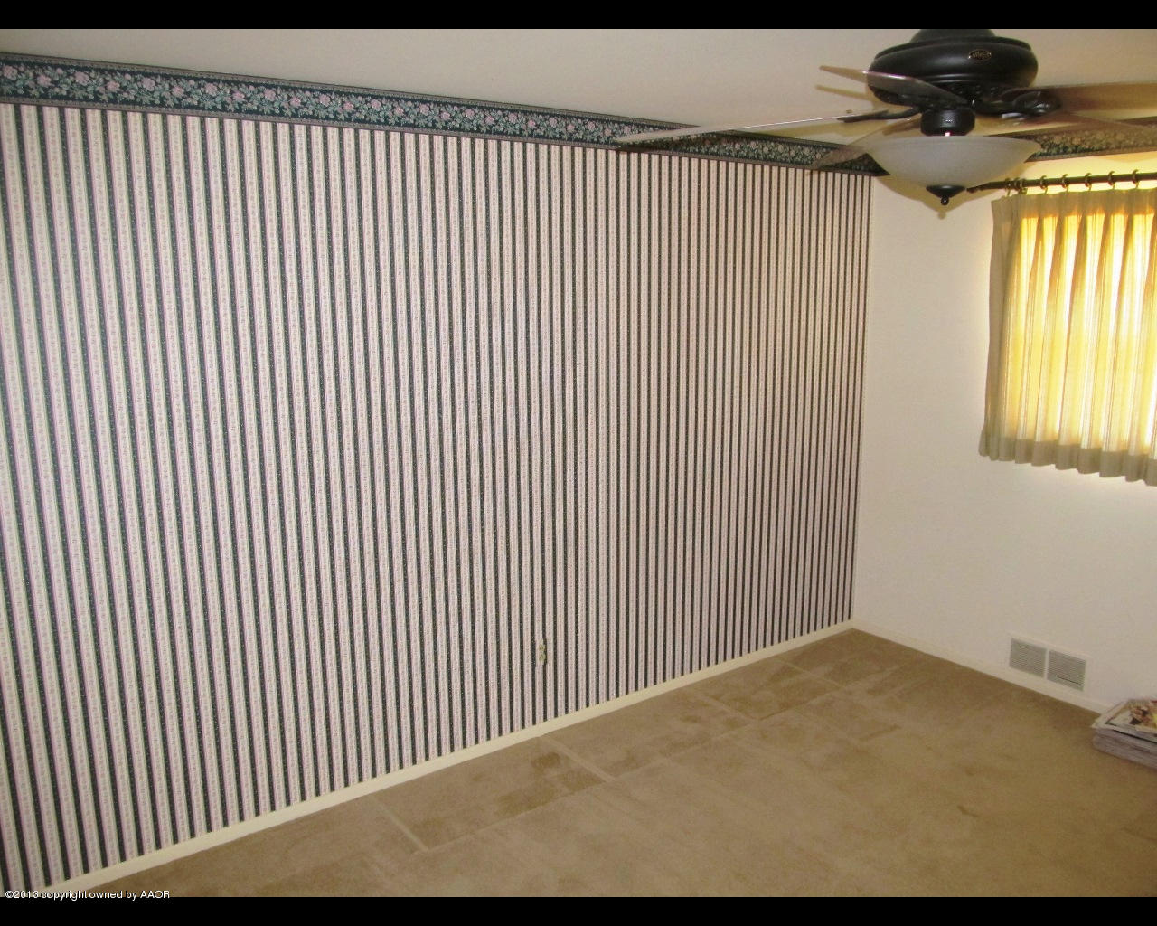 6707 Elmhurst Road Amarillo, TX 79106 - Photo 14 of 21 a view of a livingroom with a window