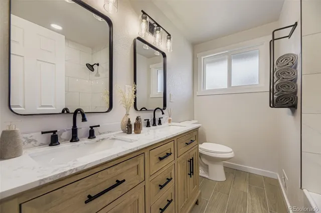 a bedroom with bed and a window