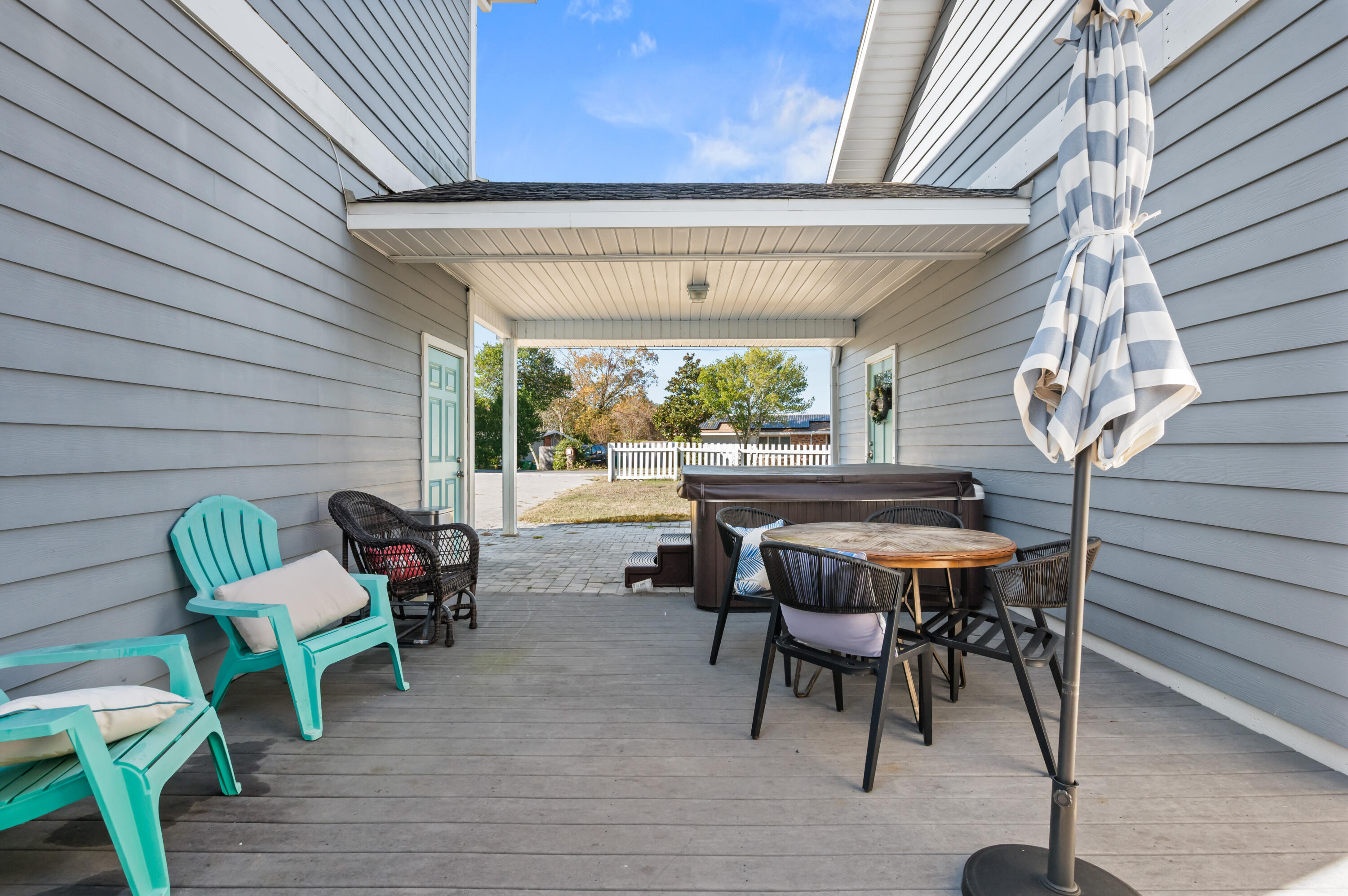 722 Kelly Street Destin, FL 32541 - Photo 11 of 54 a patio with table and chairs