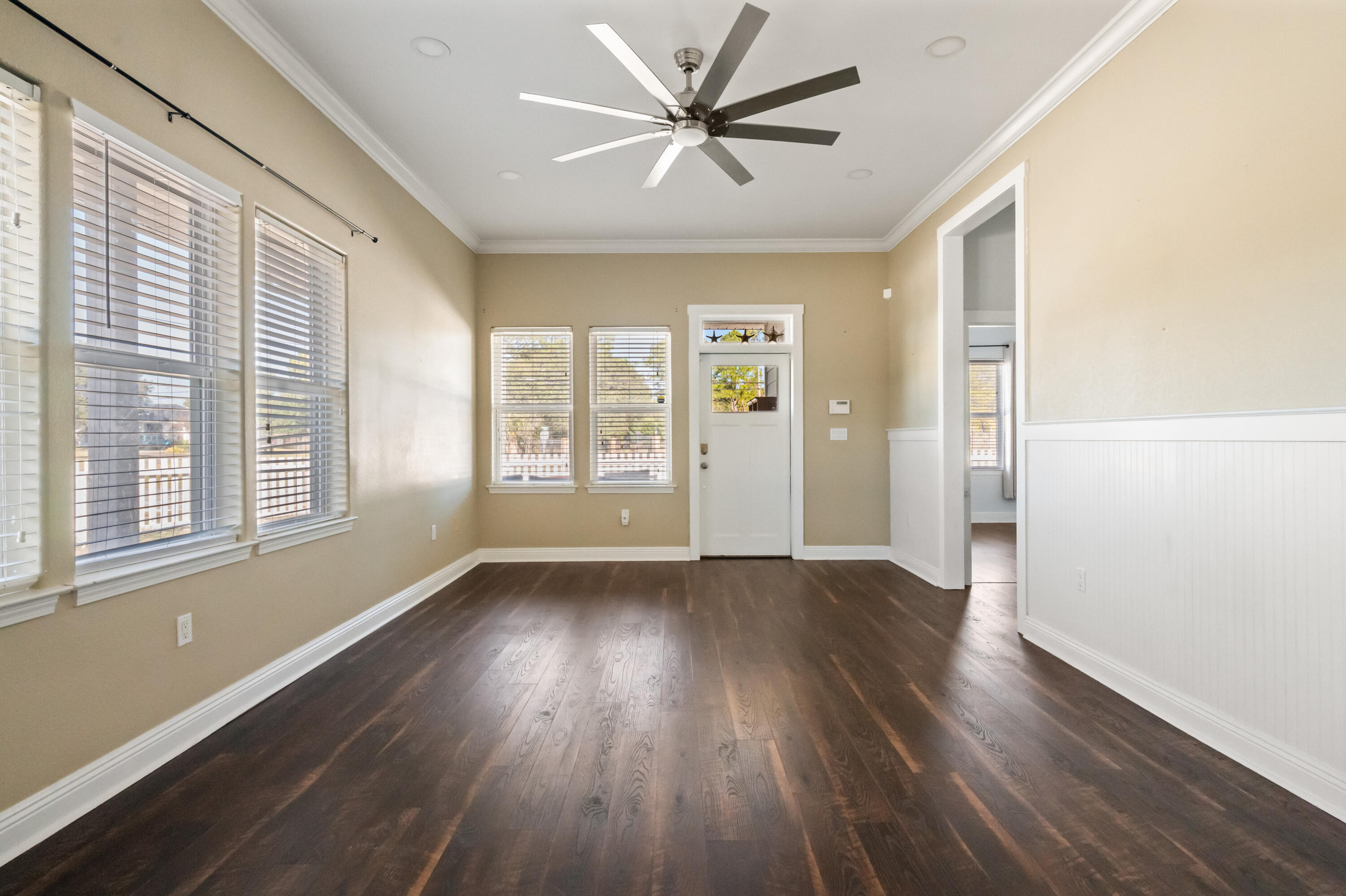 722 Kelly Street Destin, FL 32541 - Photo 19 of 54 wooden floor in an empty room with a window