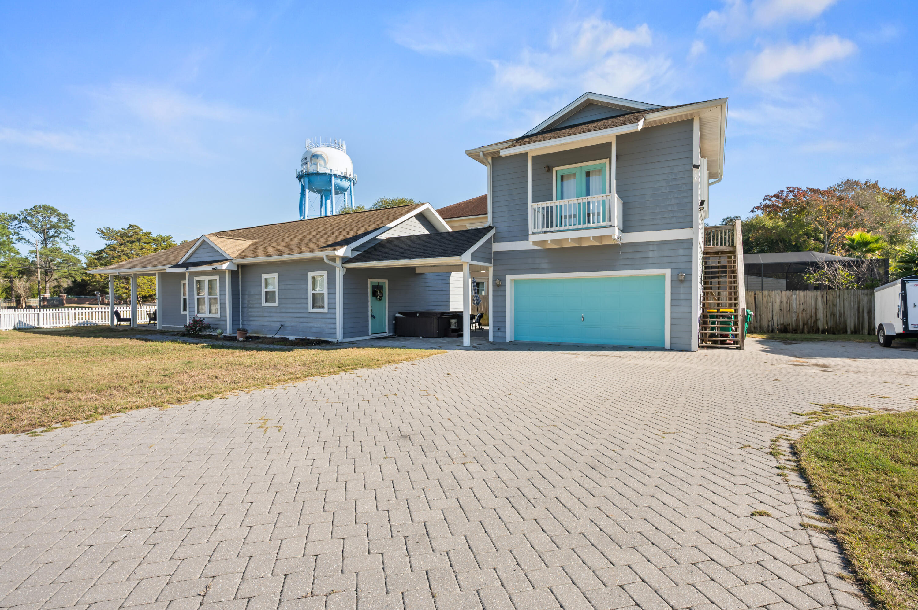 722 Kelly Street Destin, FL 32541 - Photo 2 of 54 a front view of a house with a yard