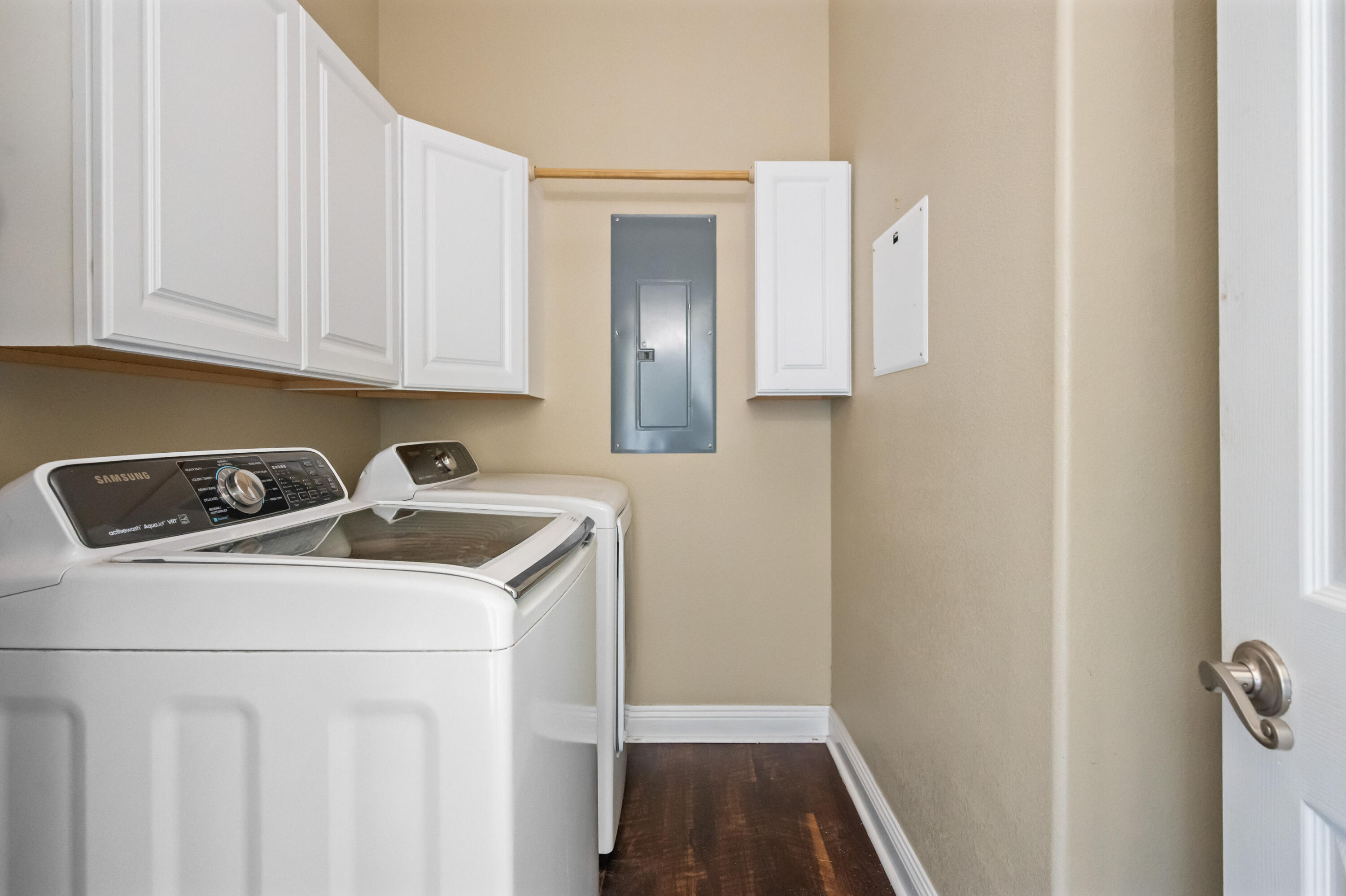 722 Kelly Street Destin, FL 32541 - Photo 21 of 54 a utility room with dryer and washer