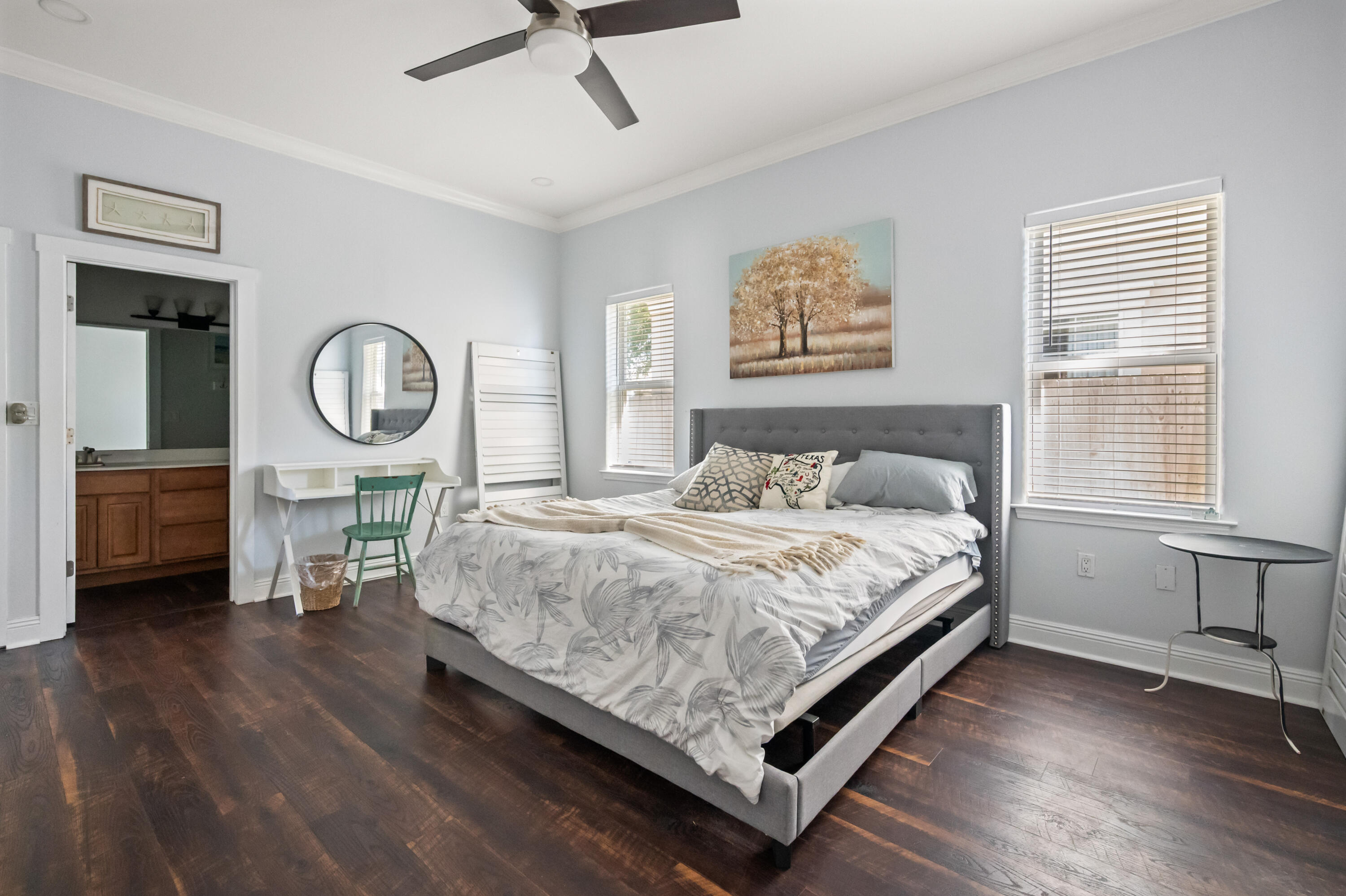 722 Kelly Street Destin, FL 32541 - Photo 25 of 54 a bedroom with a bed a mirror and a window