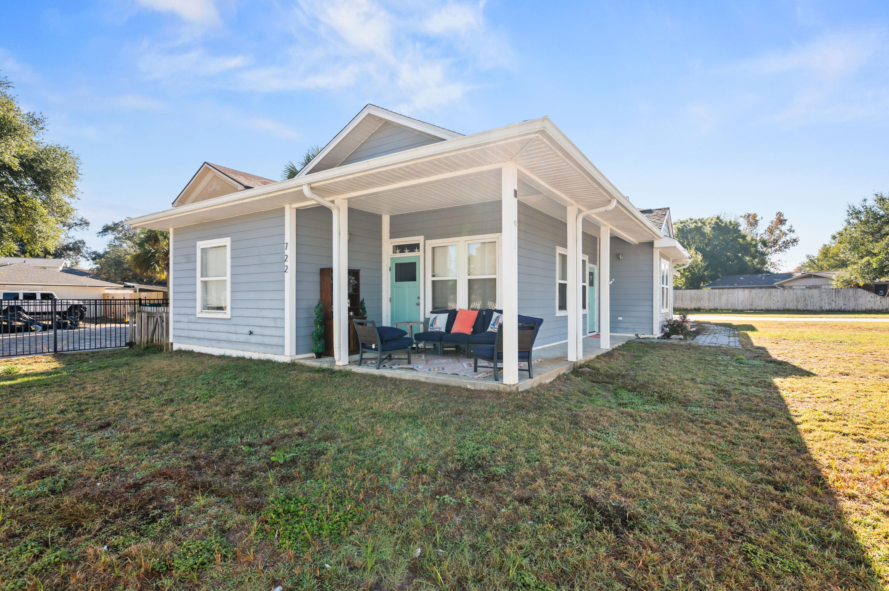 722 Kelly Street Destin, FL 32541 - Photo 4 of 54 a view of a house with backyard and sitting area