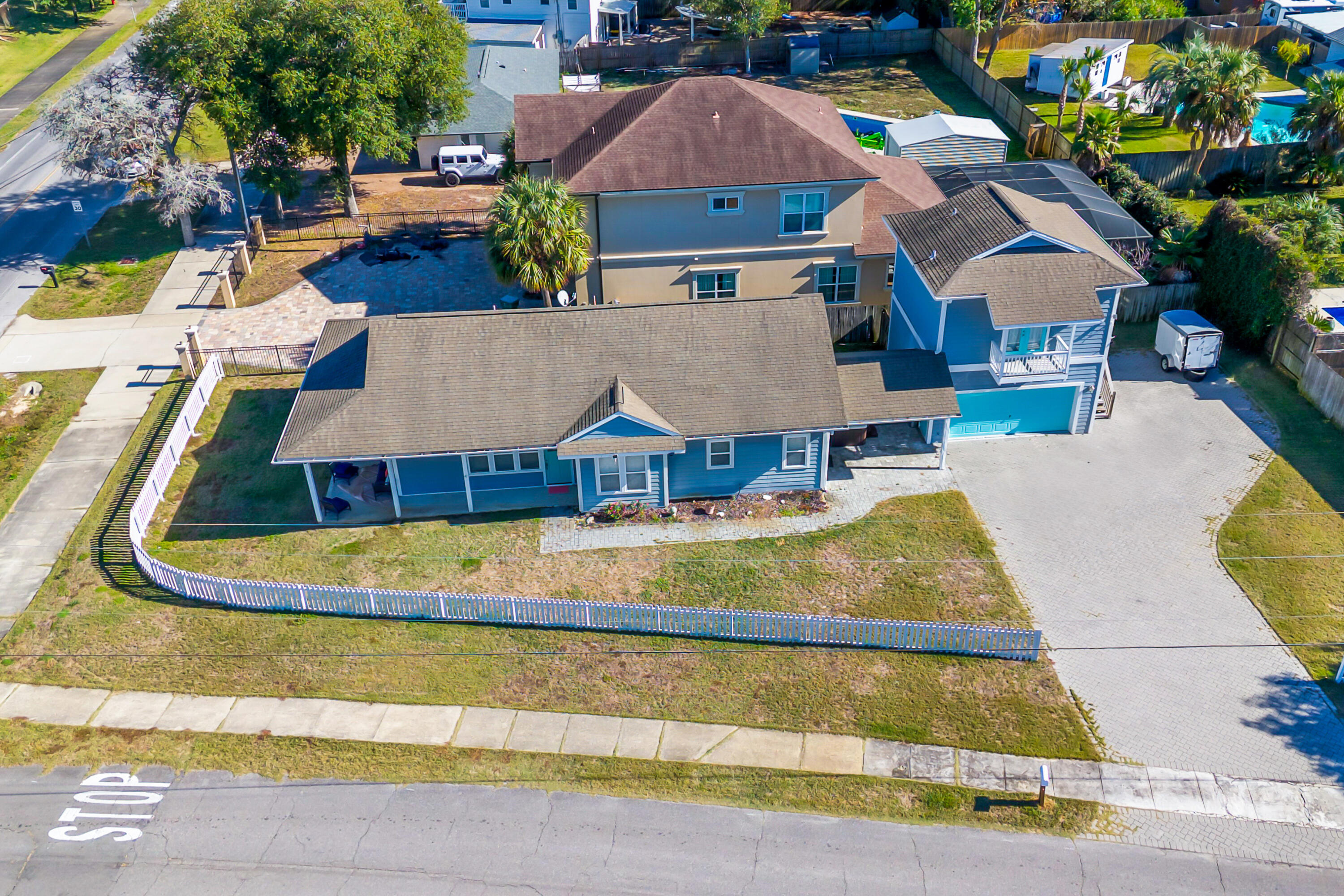 722 Kelly Street Destin, FL 32541 - Photo 46 of 54 a view of residential houses with outdoor space and parking