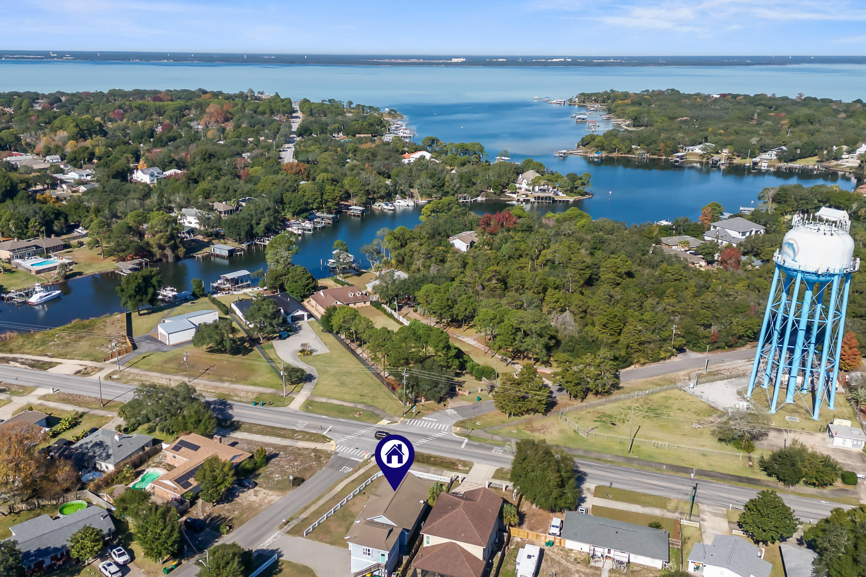 722 Kelly Street Destin, FL 32541 - Photo 50 of 54 an aerial view of residential building and lake