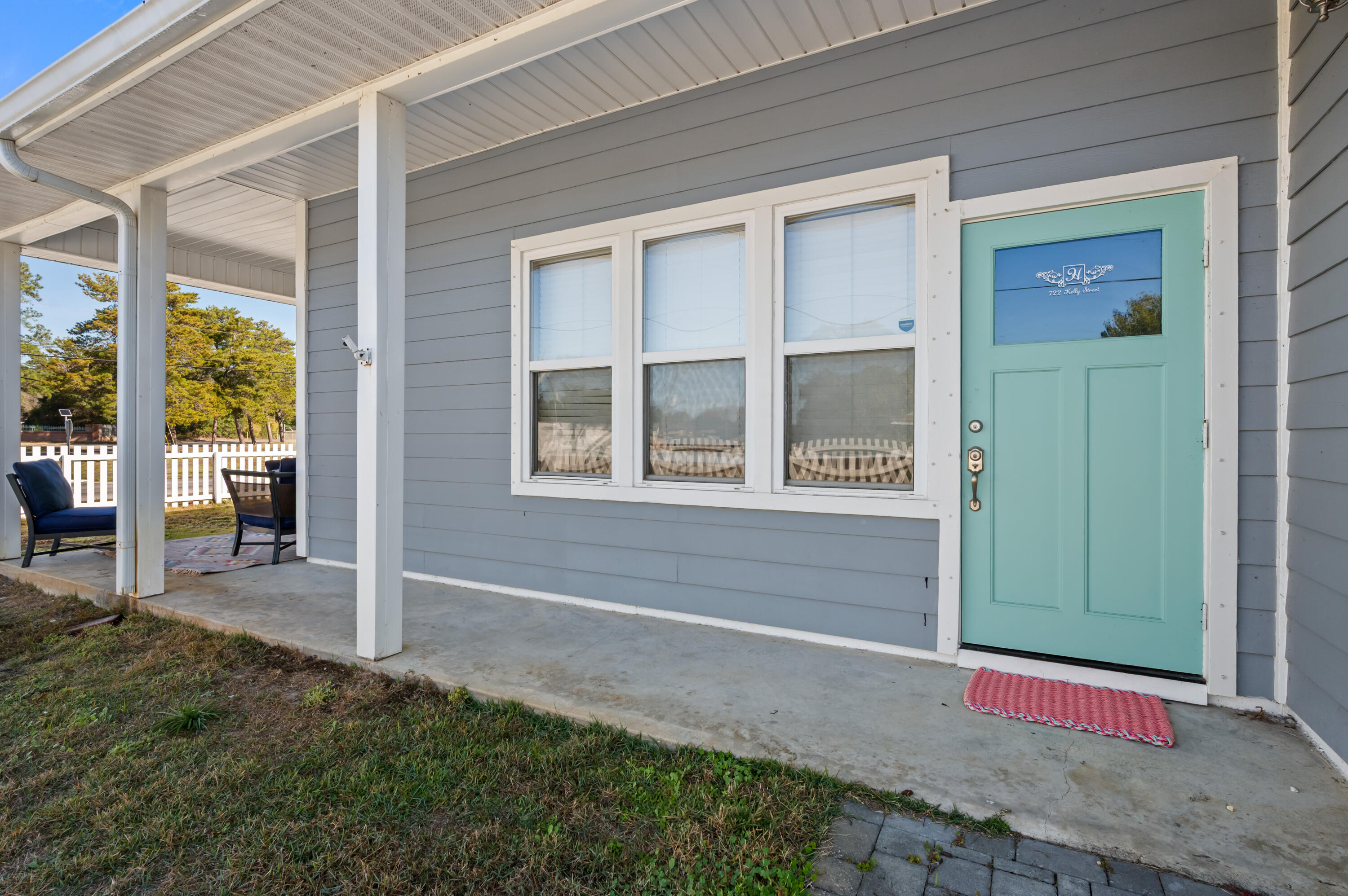 722 Kelly Street Destin, FL 32541 - Photo 9 of 54 a view of backyard with porch