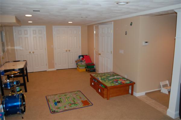 7 Glendale Road Marblehead, MA 01945 - Photo 11 of 15 a room with furniture and gym equipment