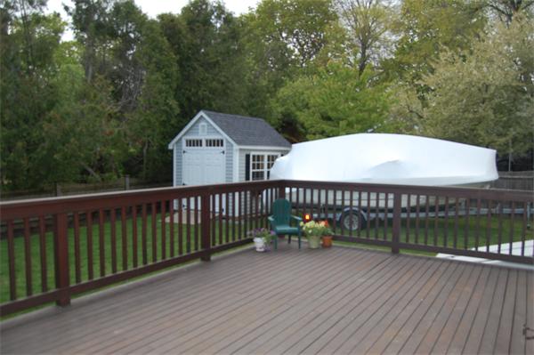 7 Glendale Road Marblehead, MA 01945 - Photo 14 of 15 a view of a wooden deck and a yard