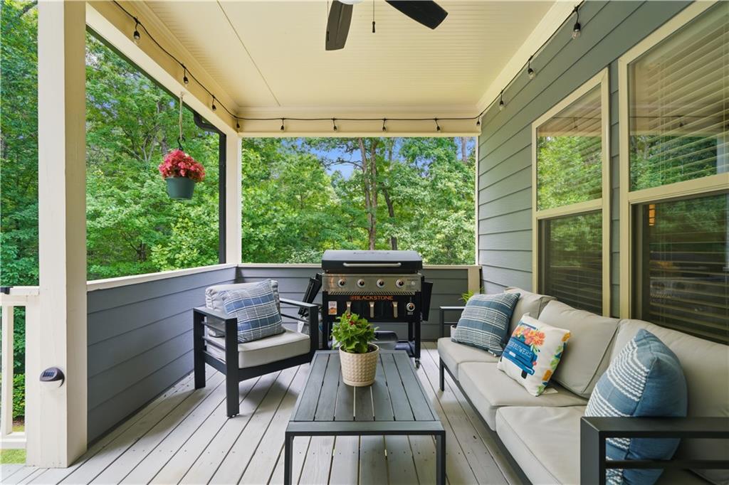 302 Spence Circle Ball Ground, GA 30107 - Photo 37 of 55 a outdoor living space with furniture and garden view