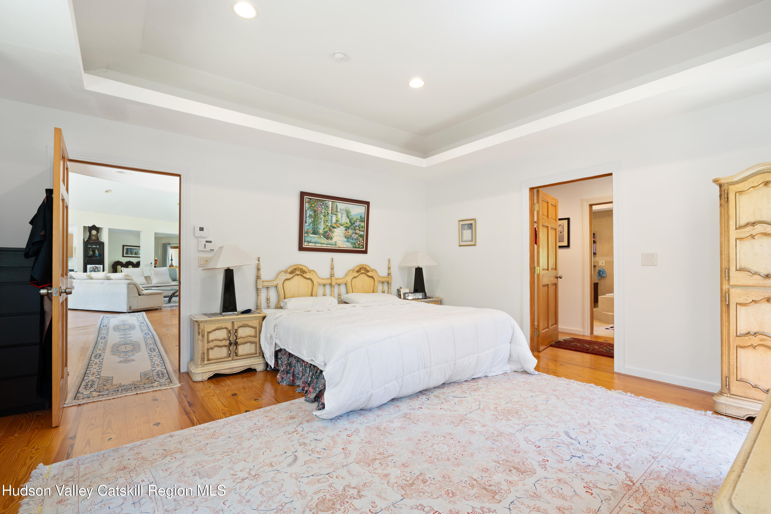 537 Mossy Hill Road Catskill, NY 12414 - Photo 85 of 105 a spacious bedroom with a bed and a dresser