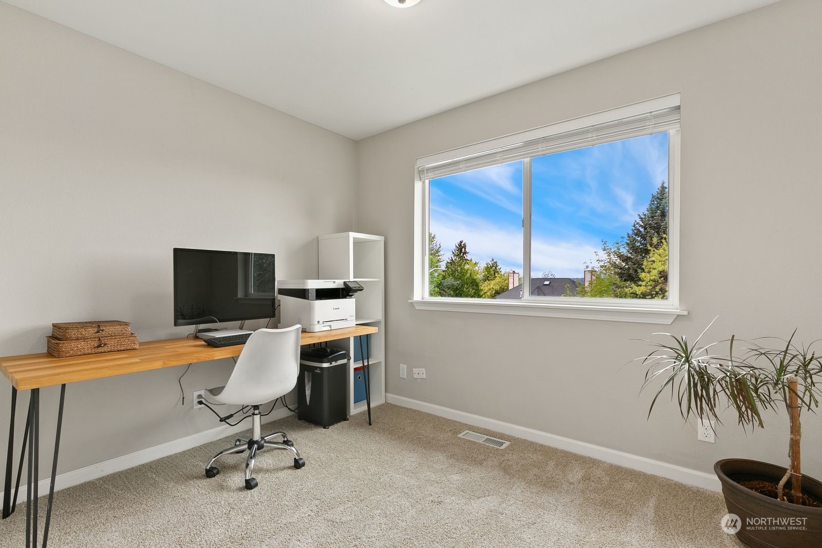 2804 Cedar Avenue South Renton, WA 98055 - Photo 20 of 26 a view of a workspace with furniture and a window