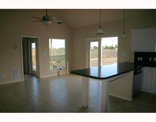 14521 East Cabana Street, Unit 503 Corpus Christi, TX 78418 - Photo 5 of 10 a view of an empty room and window