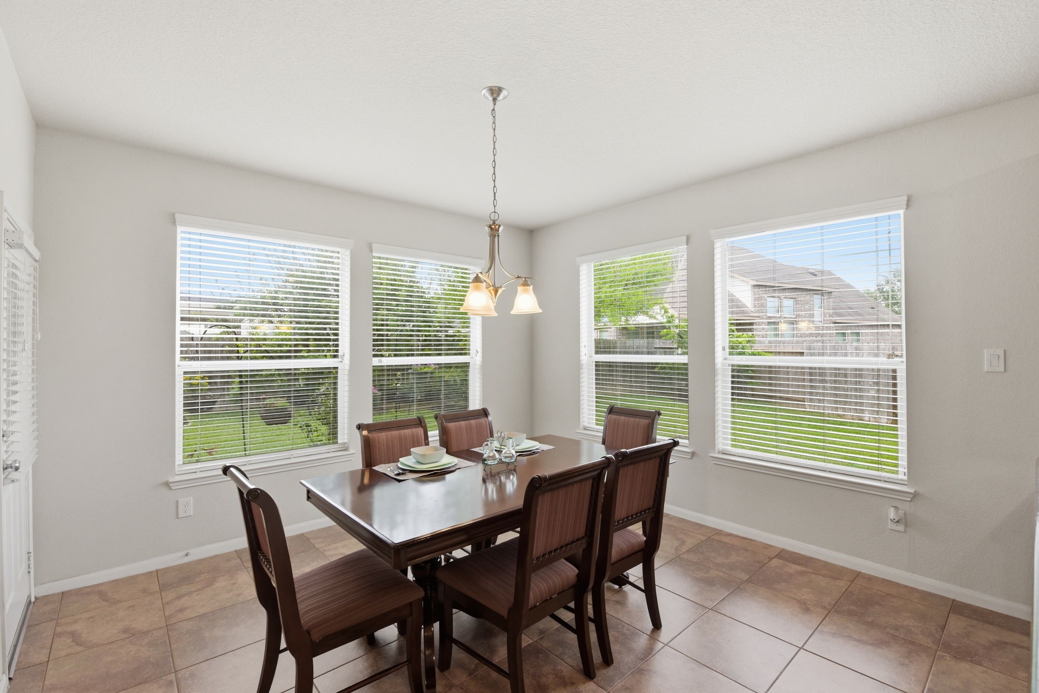 3301 Remington Rise Lane Katy, TX 77494 - Photo 15 of 50 a view of a dining room with furniture window and outside view