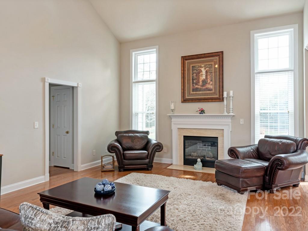 8603 Dansington Court Waxhaw, NC 28173 - Photo 17 of 45 a living room with furniture fireplace and window
