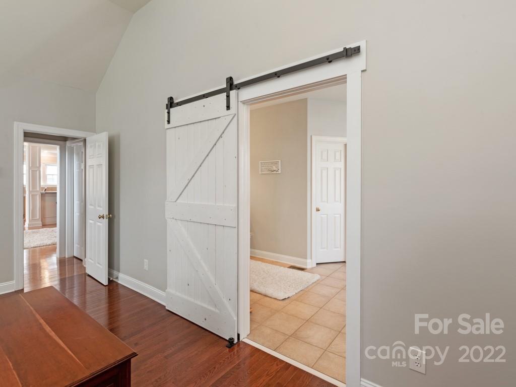 8603 Dansington Court Waxhaw, NC 28173 - Photo 22 of 45 a view of a livingroom with wooden floor