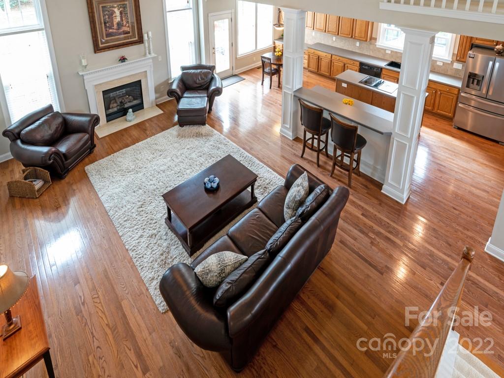 8603 Dansington Court Waxhaw, NC 28173 - Photo 27 of 45 a living room with furniture and a fireplace