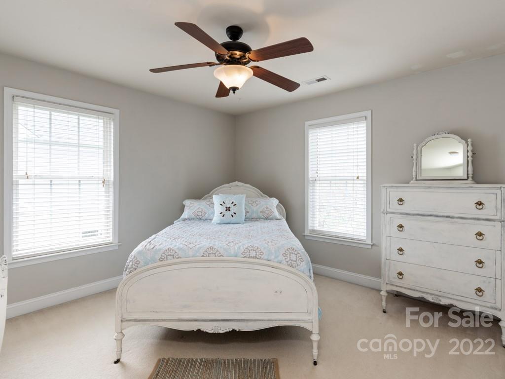 8603 Dansington Court Waxhaw, NC 28173 - Photo 33 of 45 a bedroom with a bed and a window