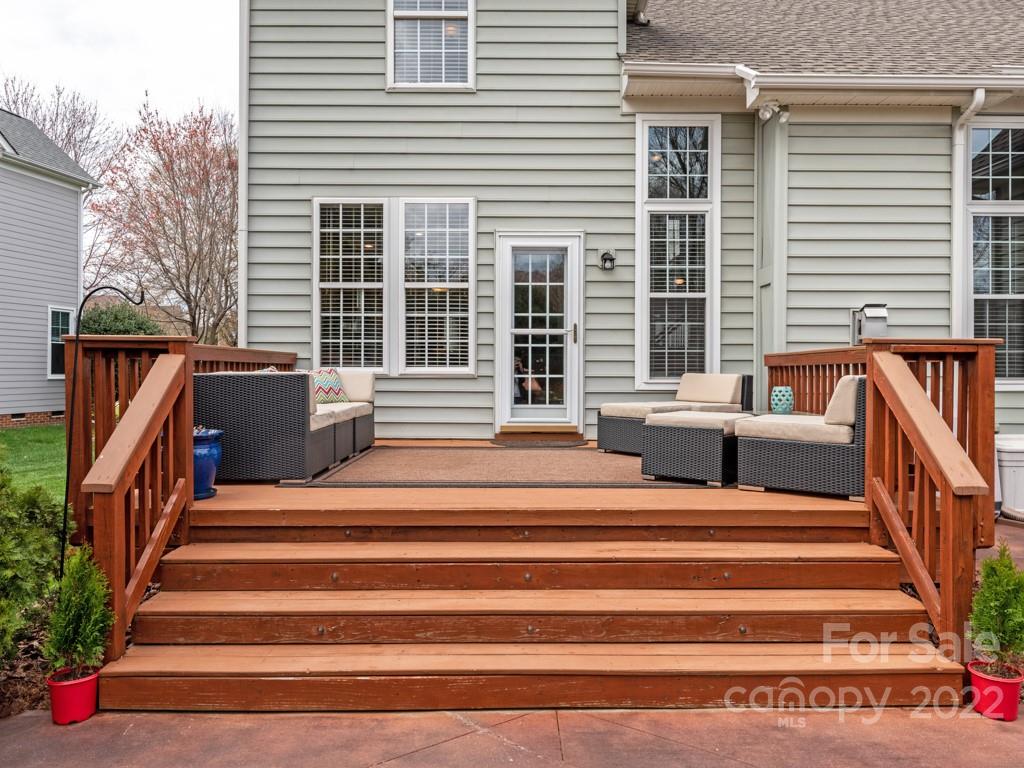 8603 Dansington Court Waxhaw, NC 28173 - Photo 42 of 45 a view of backyard with deck and seating area