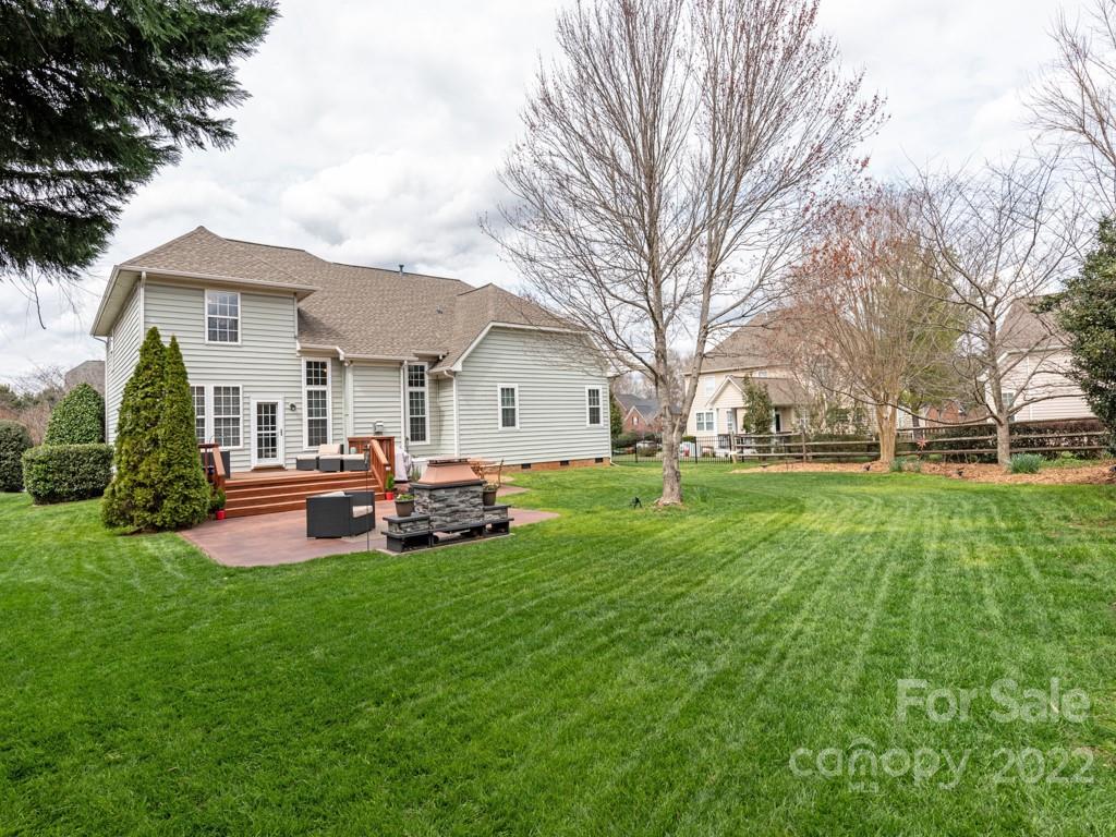 8603 Dansington Court Waxhaw, NC 28173 - Photo 44 of 45 a view of a house with a back yard