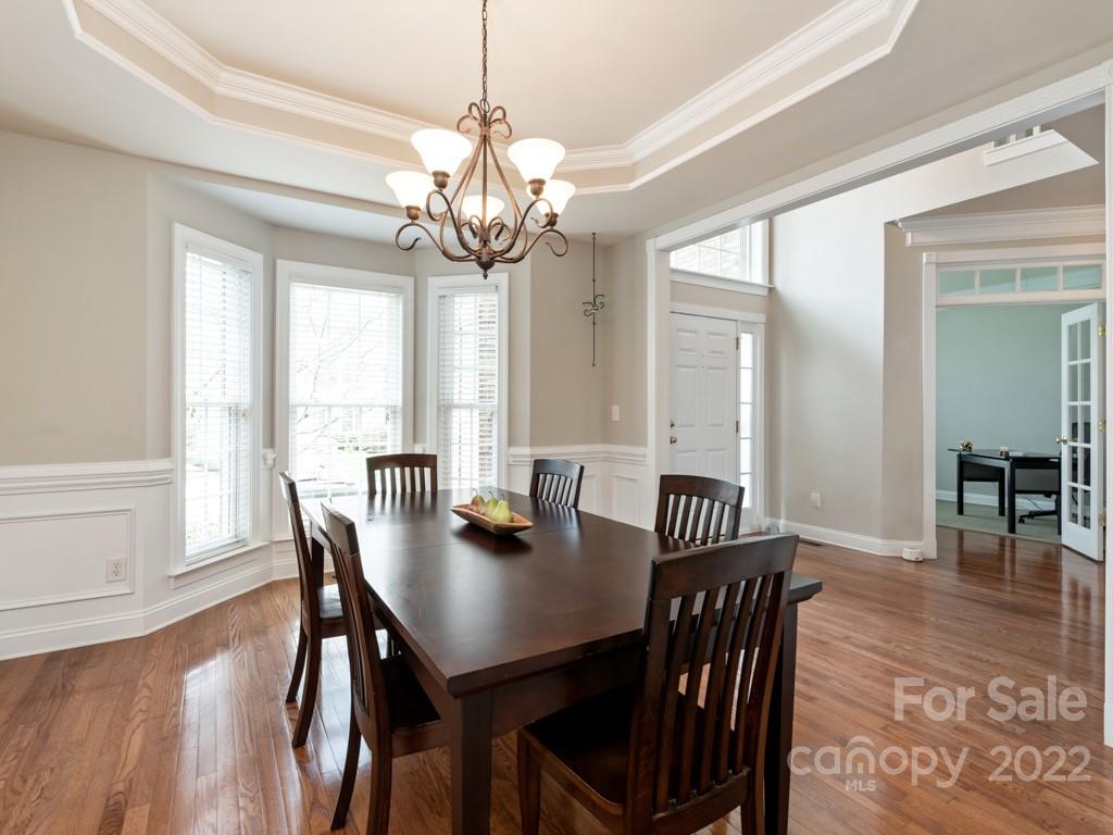 8603 Dansington Court Waxhaw, NC 28173 - Photo 6 of 45 a view of a dining room with furniture window and wooden floor