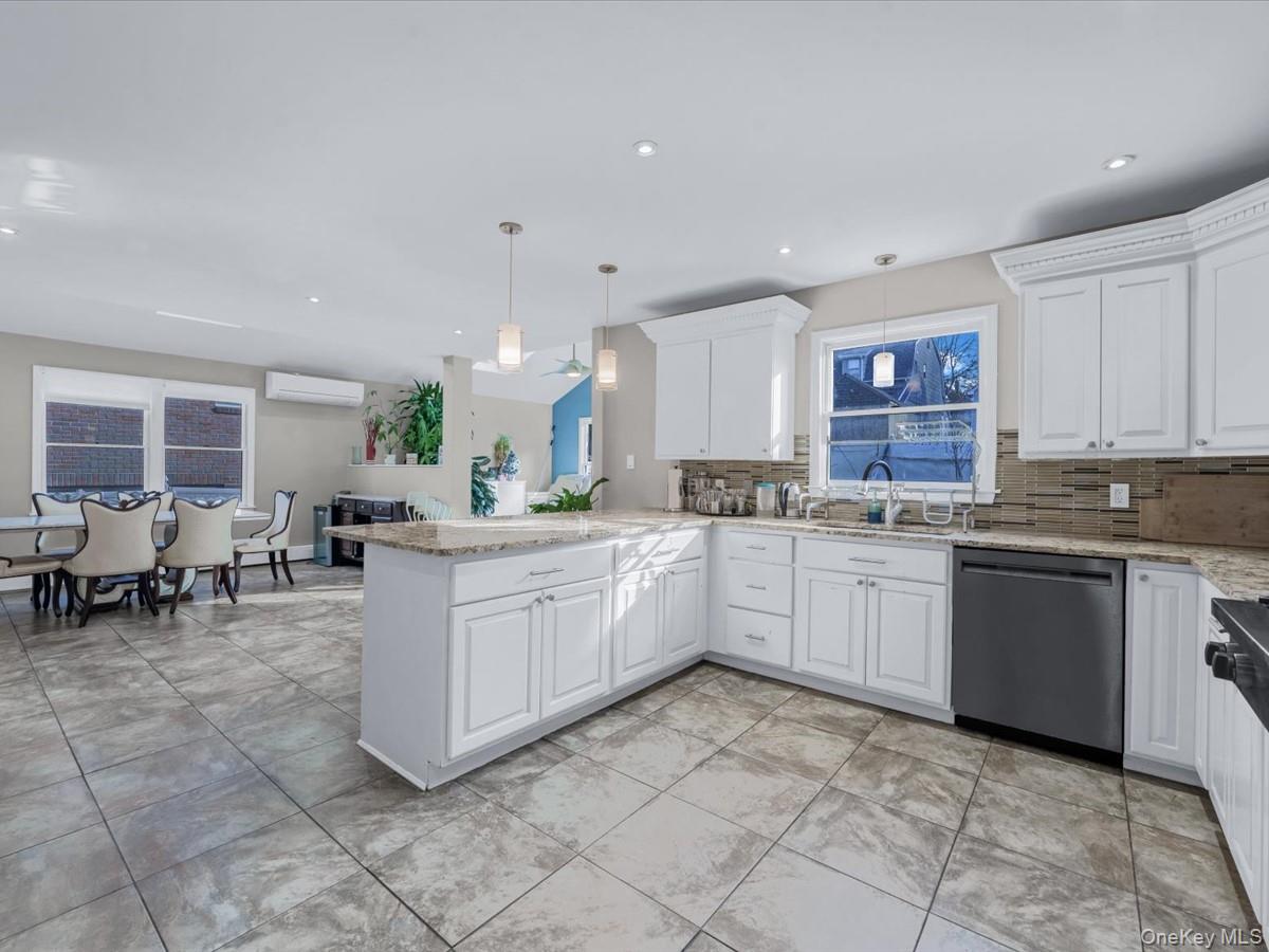 217-32 Corbett Road Queens, NY 11361 - Photo 9 of 25 a kitchen with sink cabinets and counter space