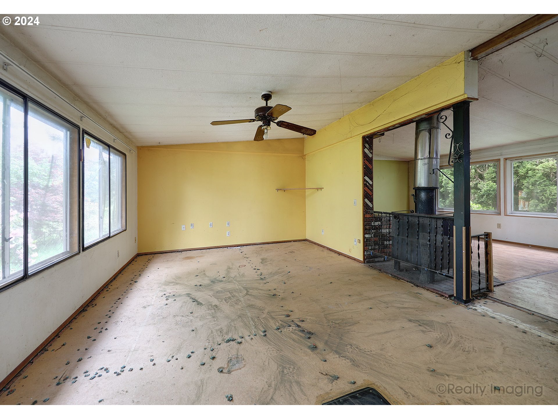 48886 Southeast Coalman Road Sandy, OR 97055 - Photo 3 of 16 a view of an empty room with a window