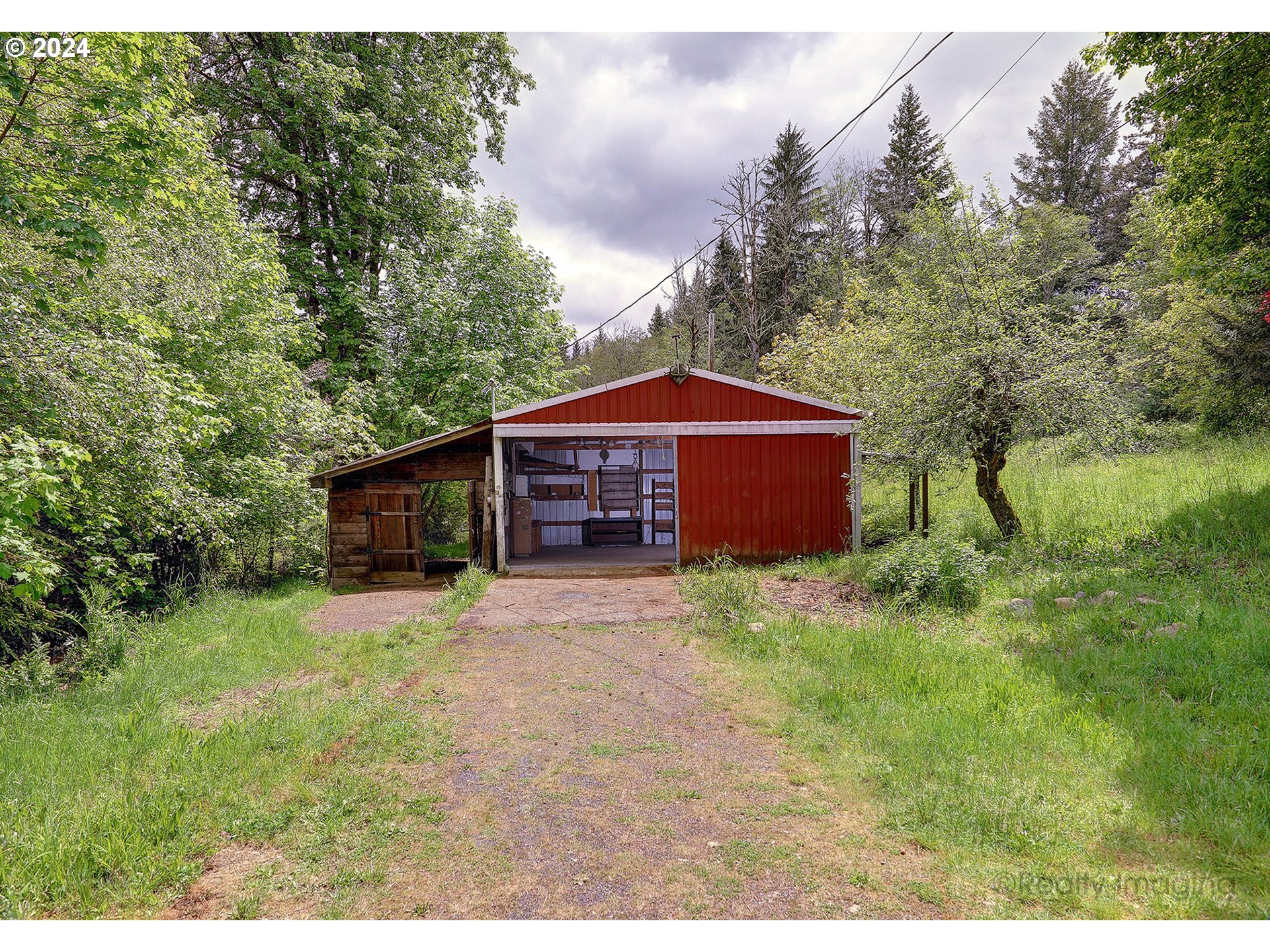 48886 Southeast Coalman Road Sandy, OR 97055 - Photo 8 of 16 a view of front of a house with a yard