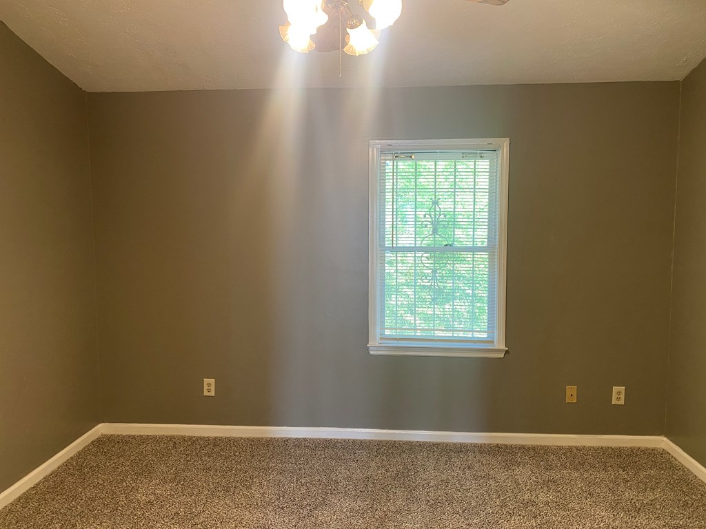 1429 14th Street Columbus, GA 31901 - Photo 8 of 11 a view of an empty room with a window
