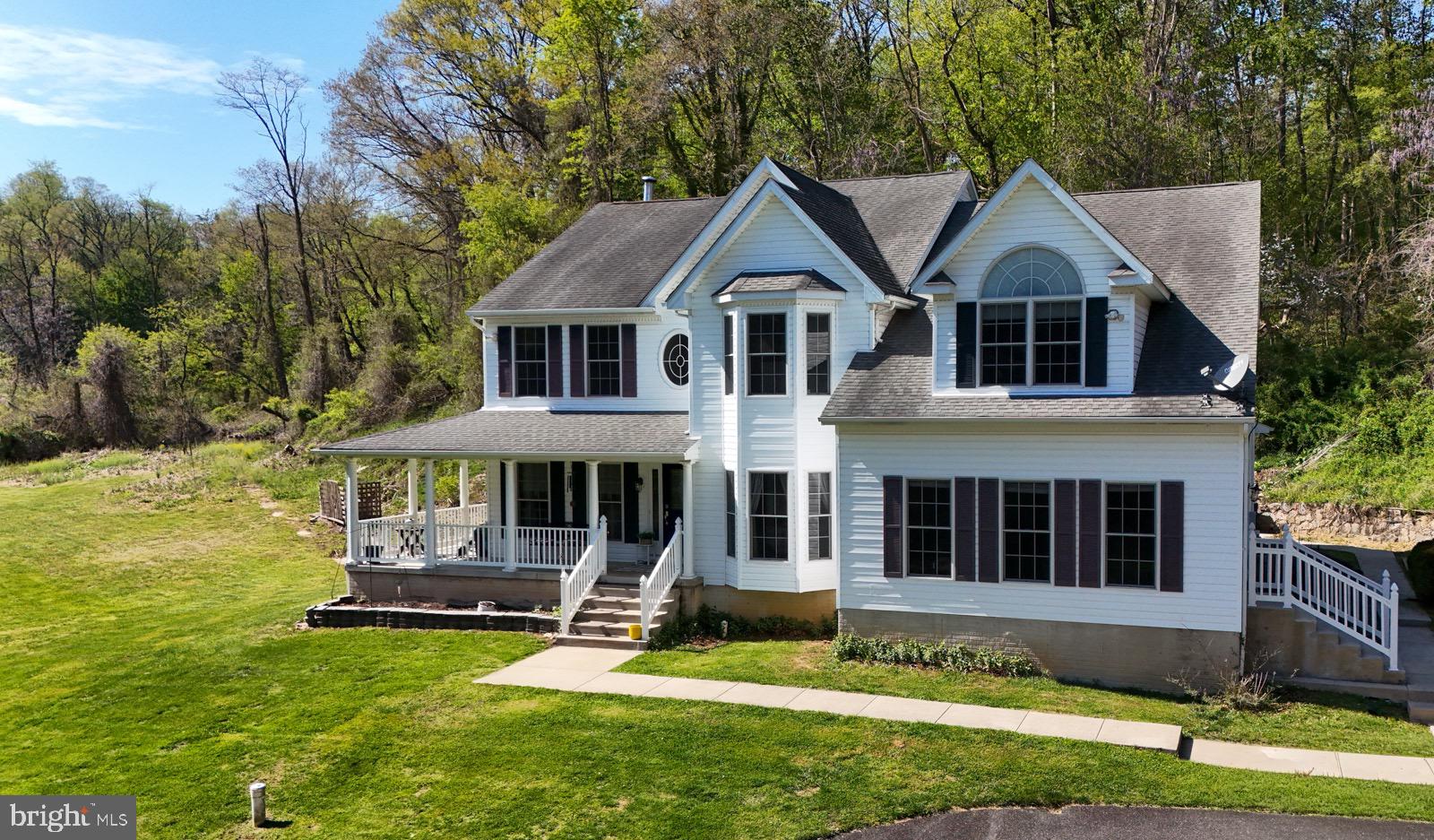 3610 Ady Road Street, MD 21154 - Photo 54 of 61 a front view of a house with a yard