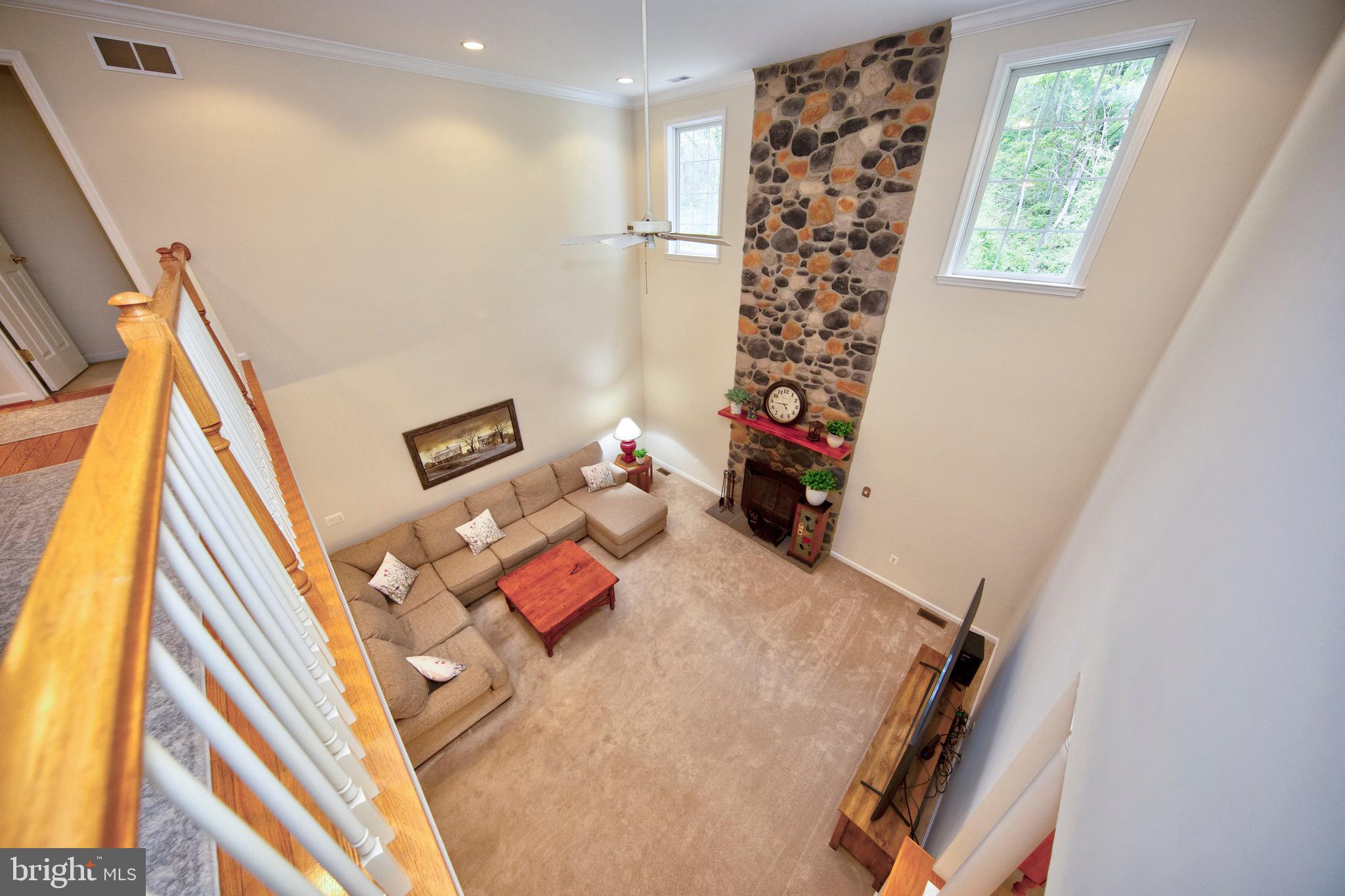 3610 Ady Road Street, MD 21154 - Photo 8 of 59 Central family room with beautiful stone fireplace