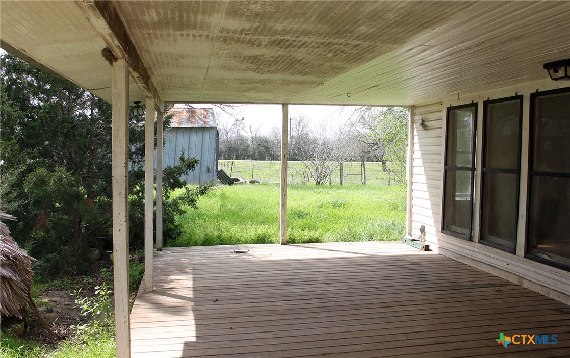 108 Sorrell Street Red Rock, TX 78662 - Photo 34 of 36 a view of a house with backyard and garden