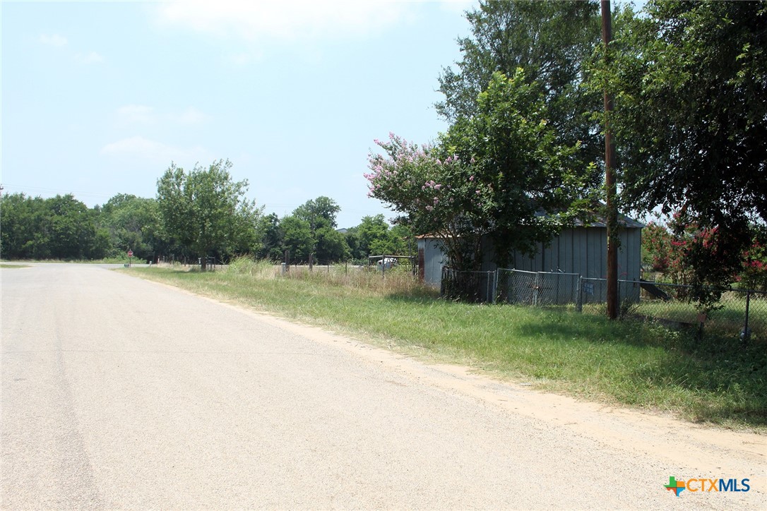 108 Sorrell Street Red Rock, TX 78662 - Photo 5 of 36 a backyard of a house with lots of green space