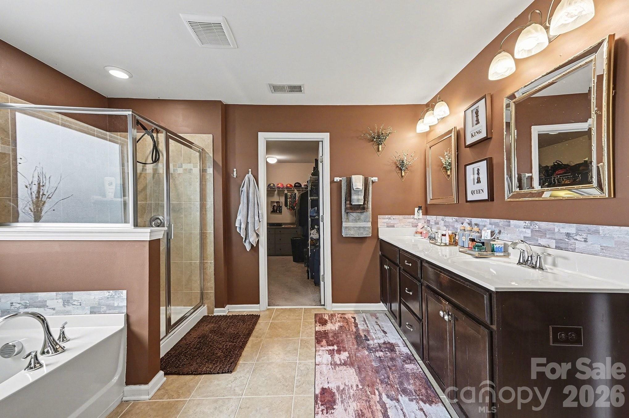 12614 Chantrey Way Huntersville, NC 28078 - Photo 15 of 31 a bathroom with a sink and a mirror