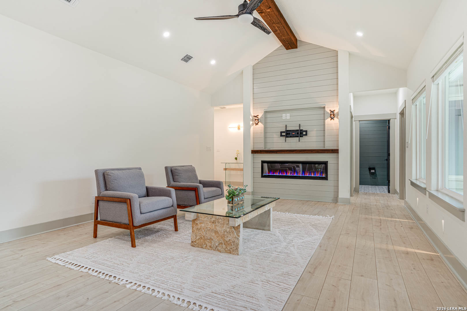 316 Prairie Tea Lane Spring Branch, TX 78070 - Photo 8 of 38 a living room with furniture and a fireplace
