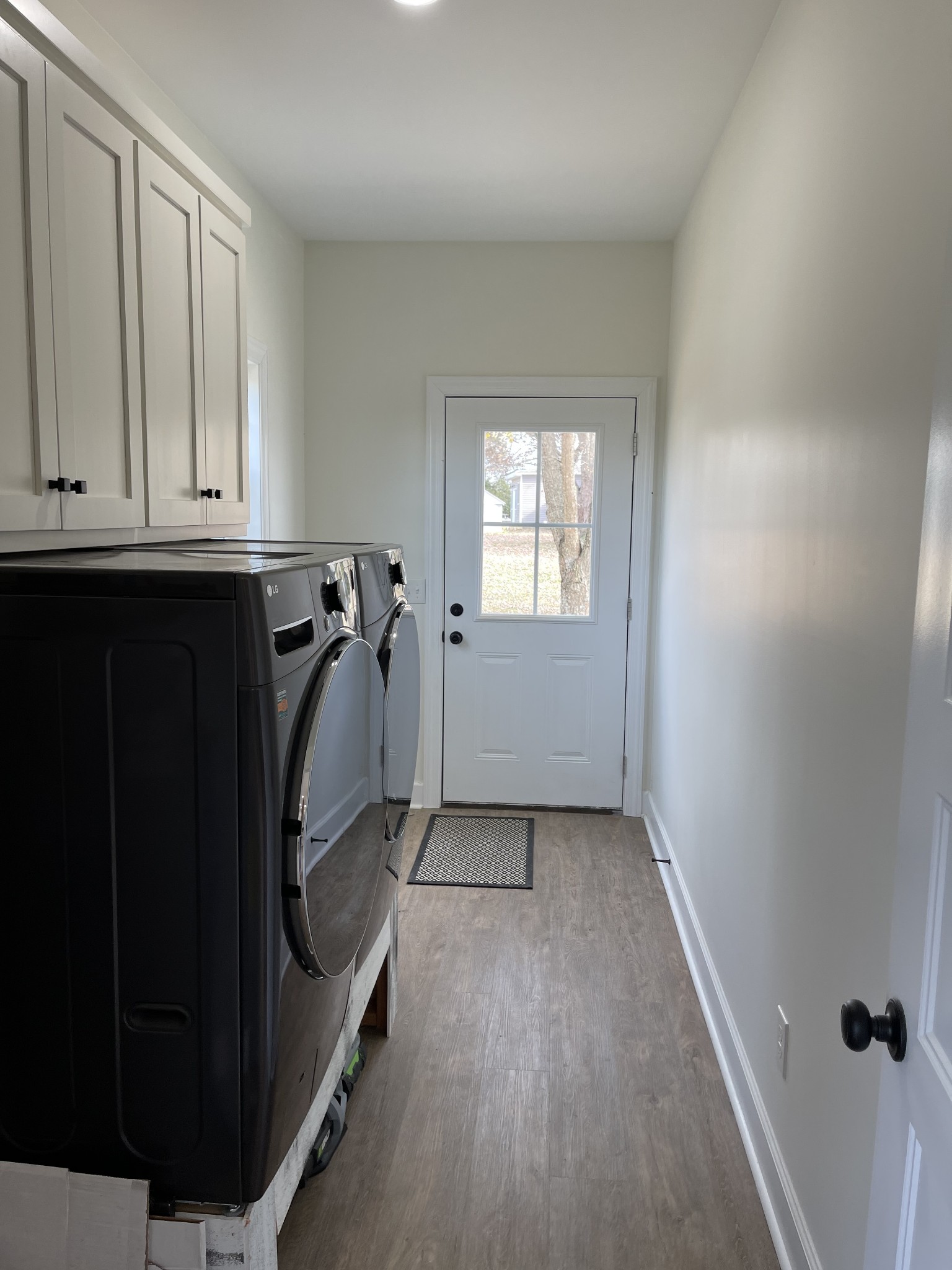 136 Dunn Fall River Road Leoma, TN 38468 - Photo 12 of 25 a view of hallway with washer and dryer