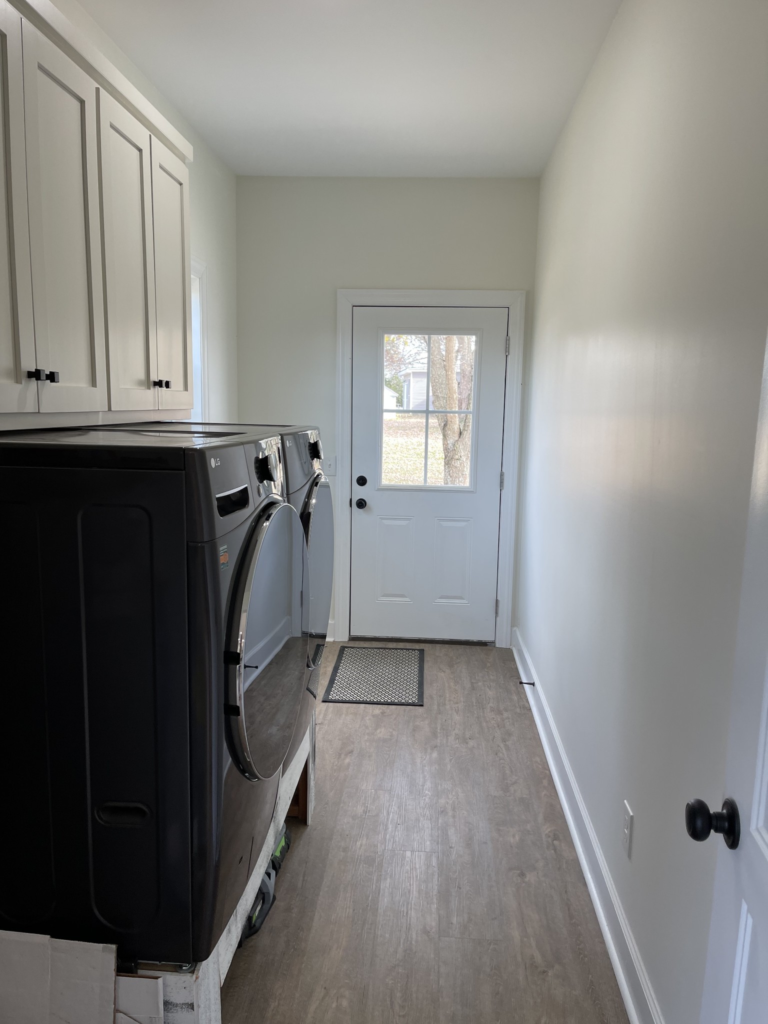 136 Dunn Fall River Road Leoma, TN 38468 - Photo 13 of 25 an entryway with wooden floor and cabinet