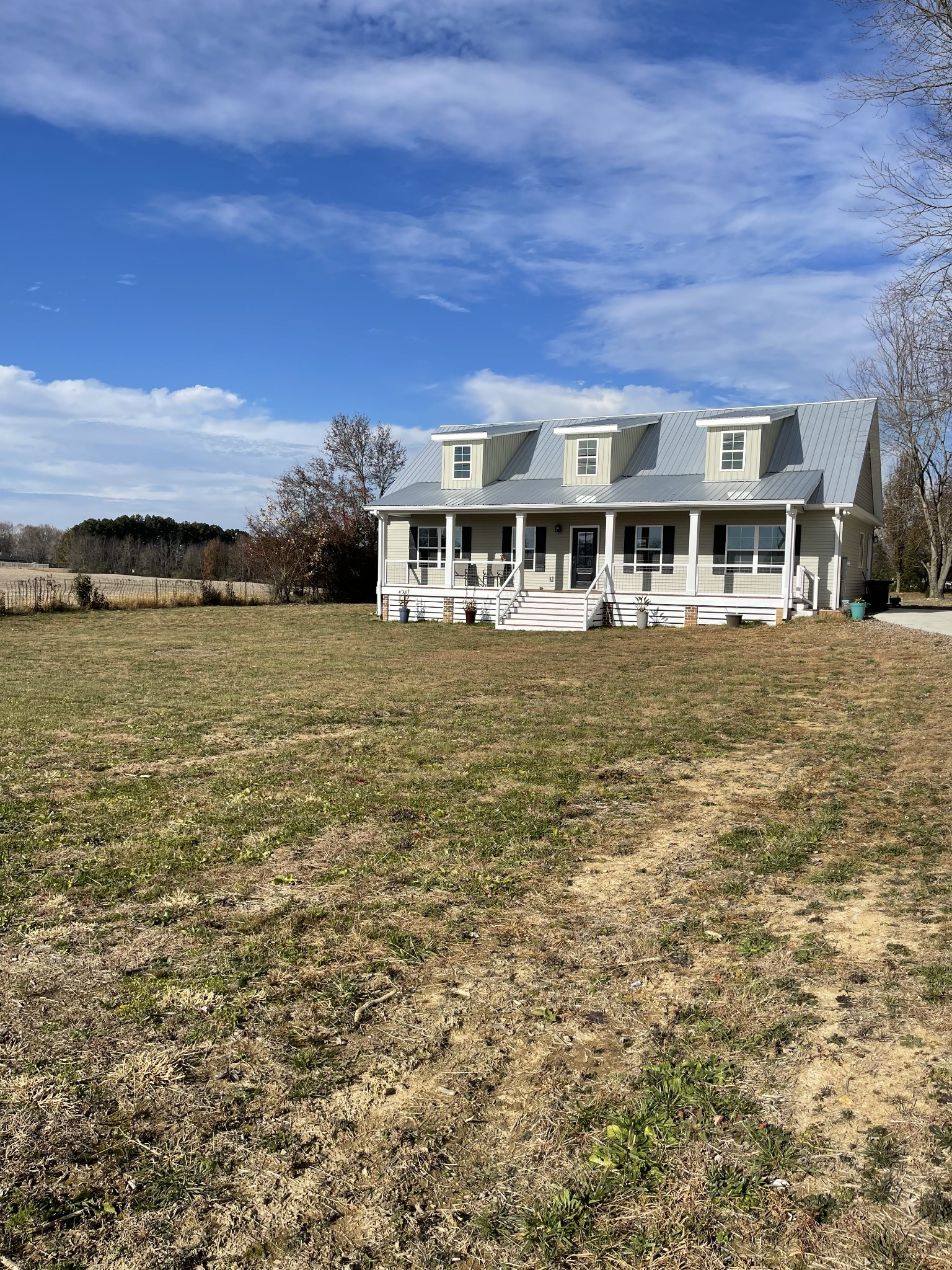 136 Dunn Fall River Road Leoma, TN 38468 - Photo 3 of 25 front view of a building with a yard