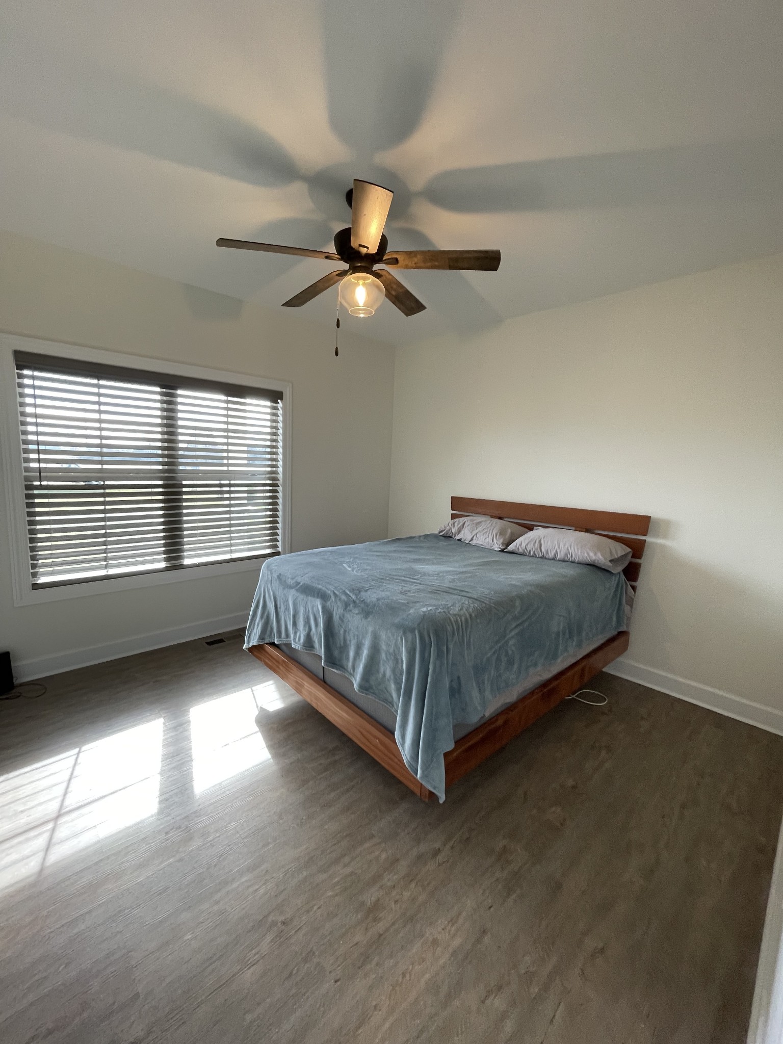 136 Dunn Fall River Road Leoma, TN 38468 - Photo 22 of 25 a bedroom with a bed and window