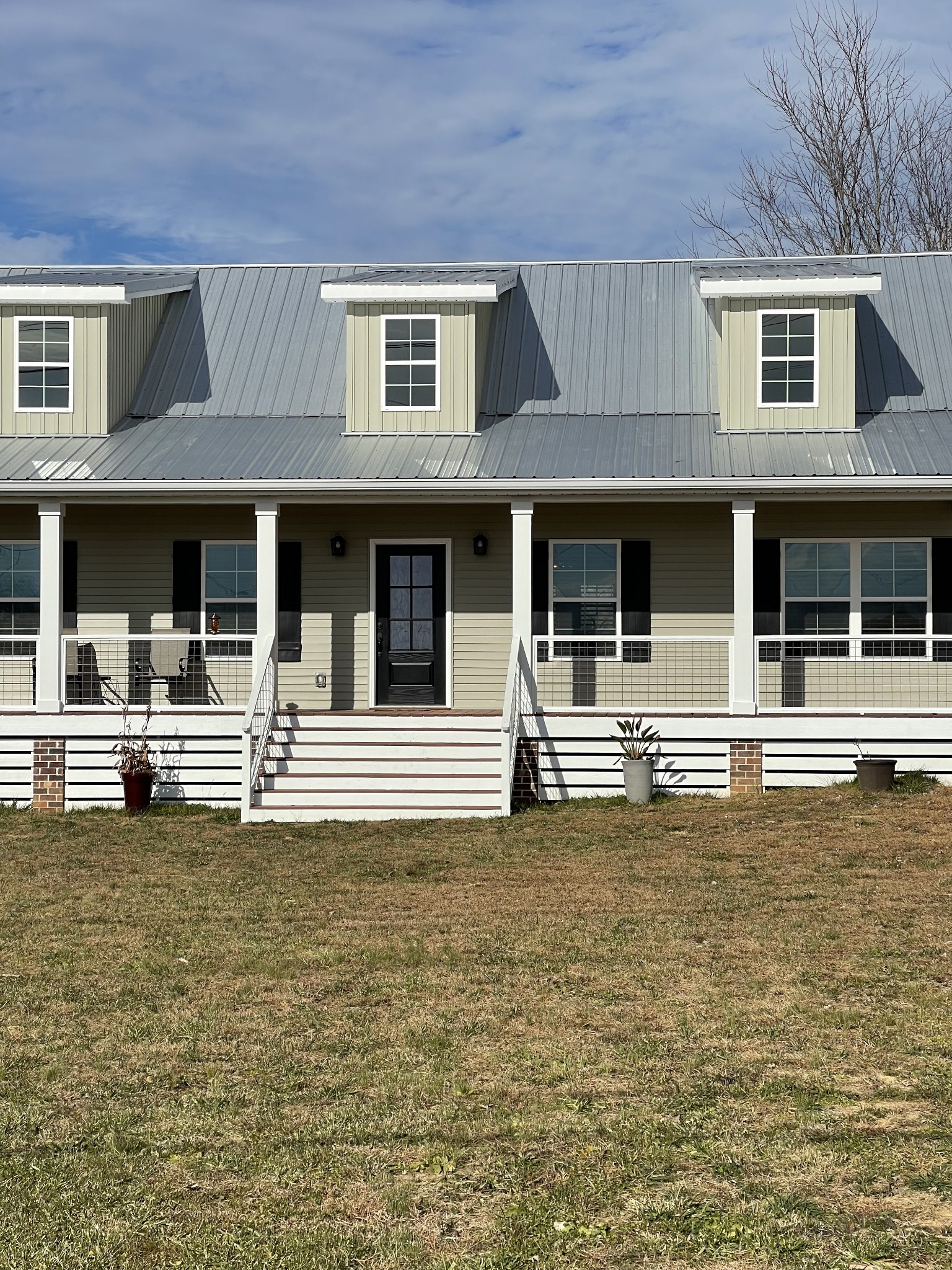 136 Dunn Fall River Road Leoma, TN 38468 - Photo 4 of 25 a house with swimming pool in front of it