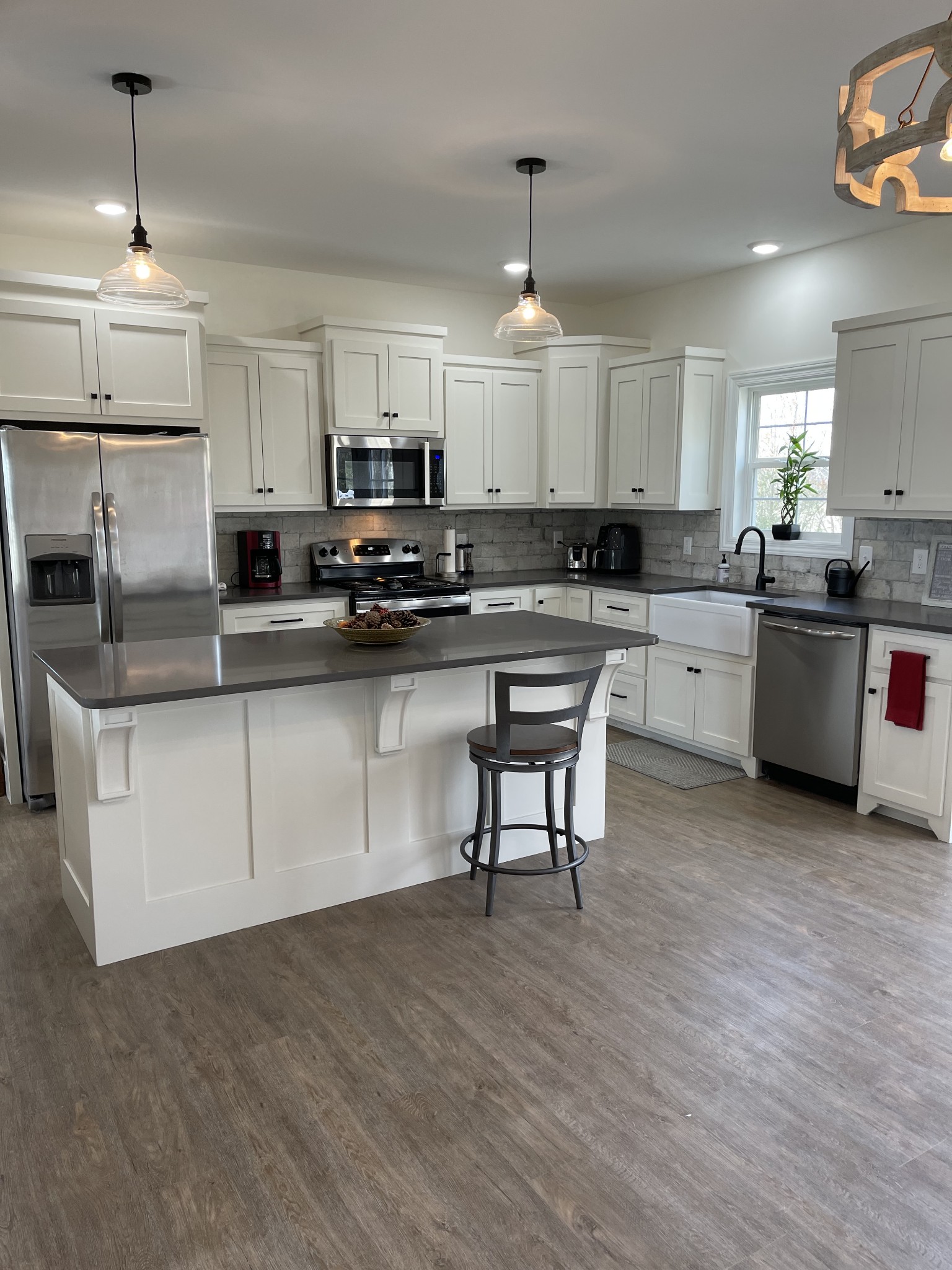 136 Dunn Fall River Road Leoma, TN 38468 - Photo 7 of 25 a kitchen with cabinets a sink and appliances