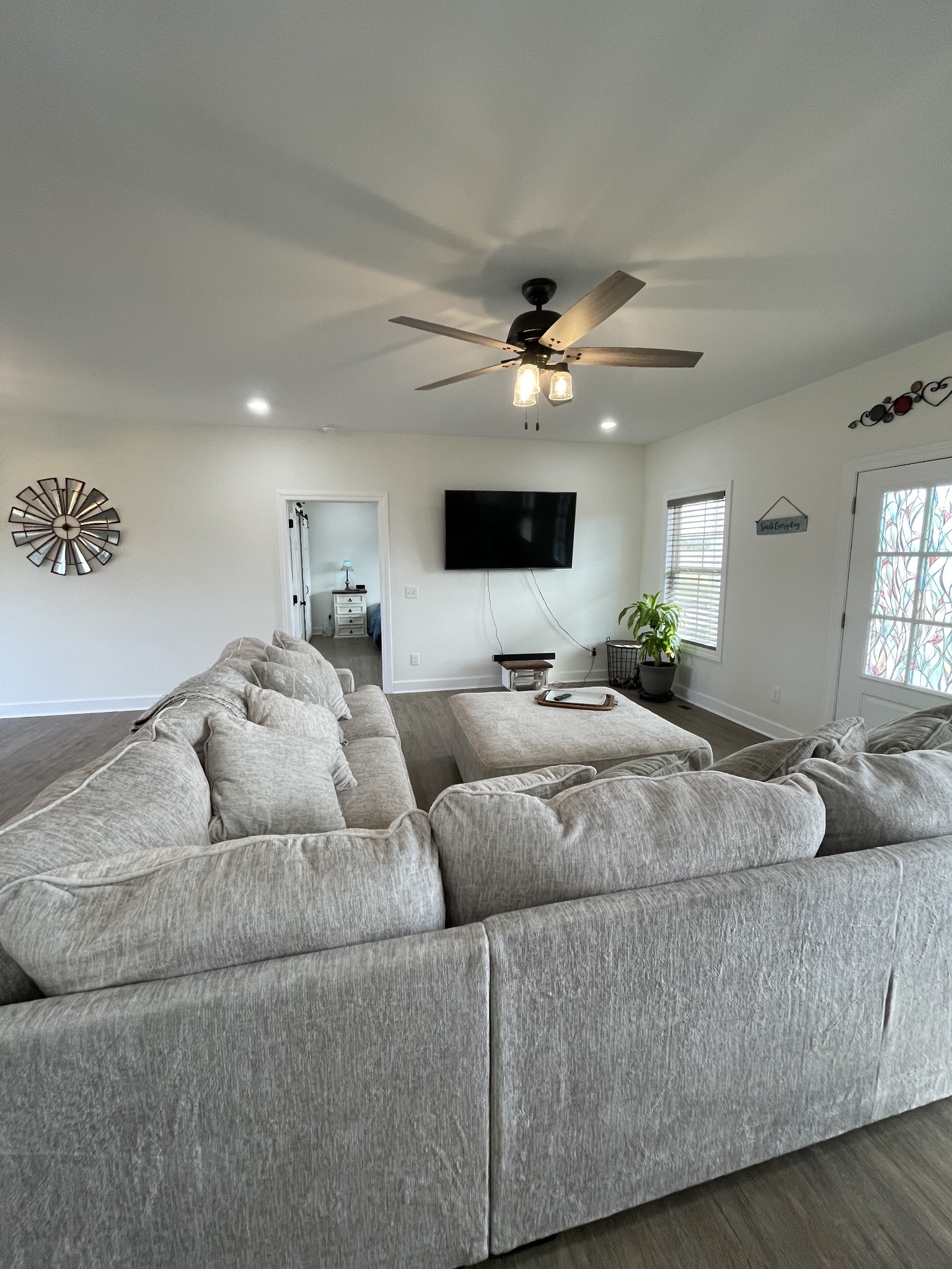 136 Dunn Fall River Road Leoma, TN 38468 - Photo 8 of 25 a living room with furniture and a flat screen tv